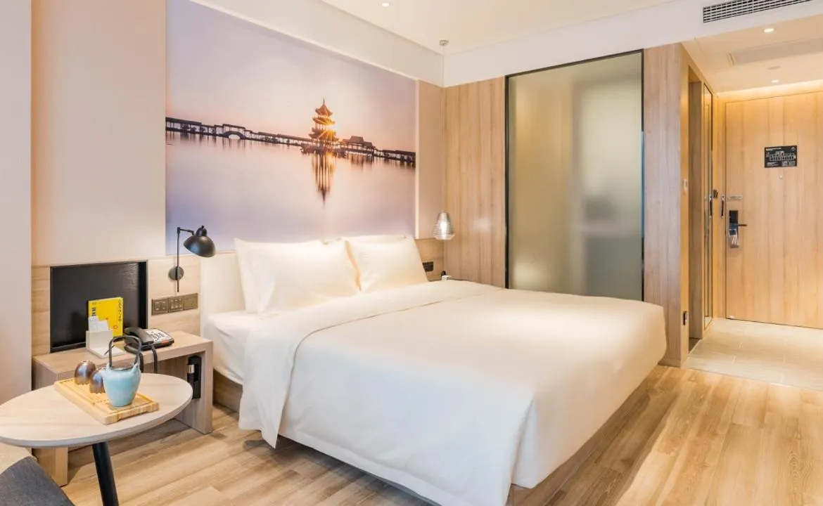 Bed in Atour Hotel Wuxi Sanyang Plaza