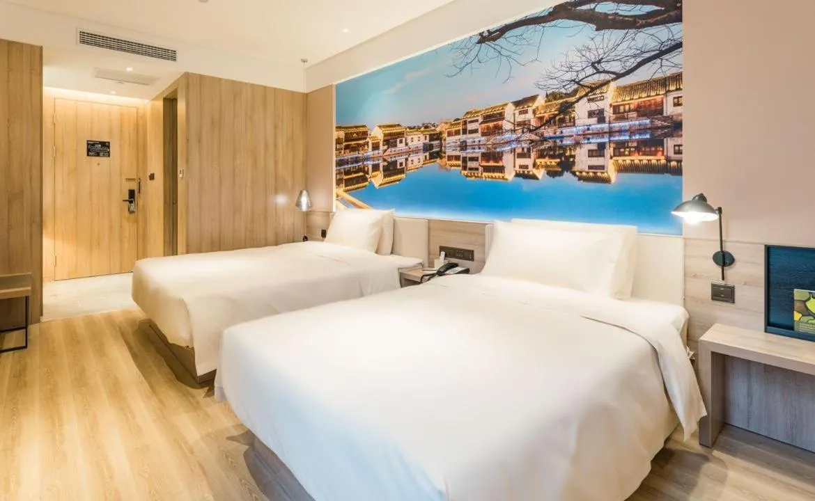 Bed in Atour Hotel Wuxi Sanyang Plaza