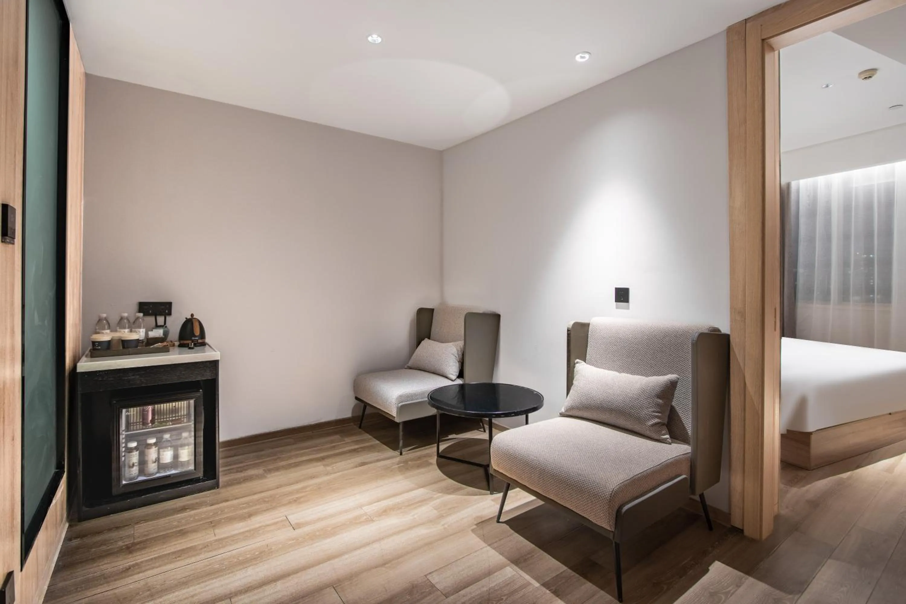 Living room, Bed in Atour Hotel Hangzhou Xiaoshan Peoples Square