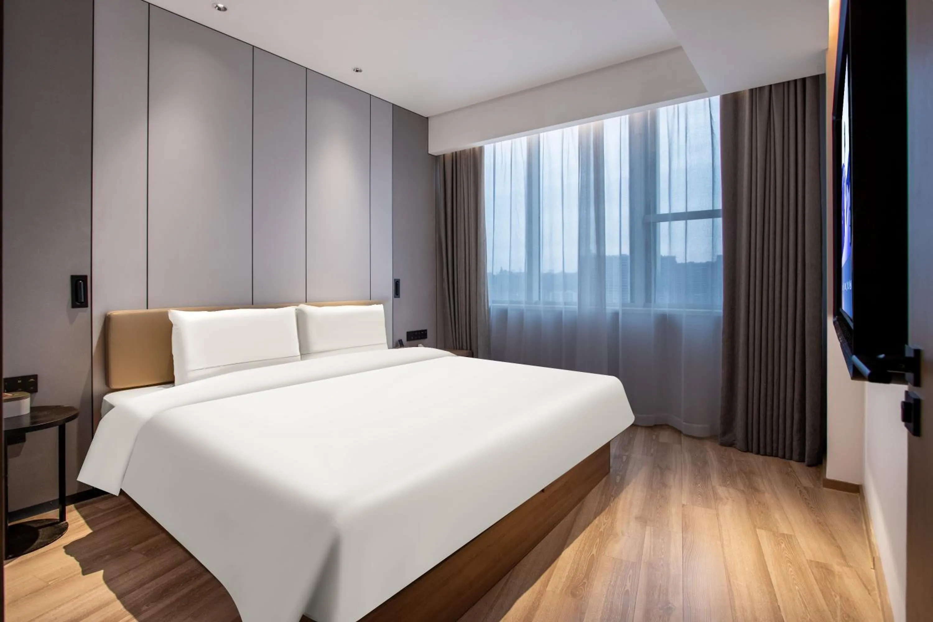 Photo of the whole room, Bed in Atour Hotel Hangzhou Xiaoshan Peoples Square