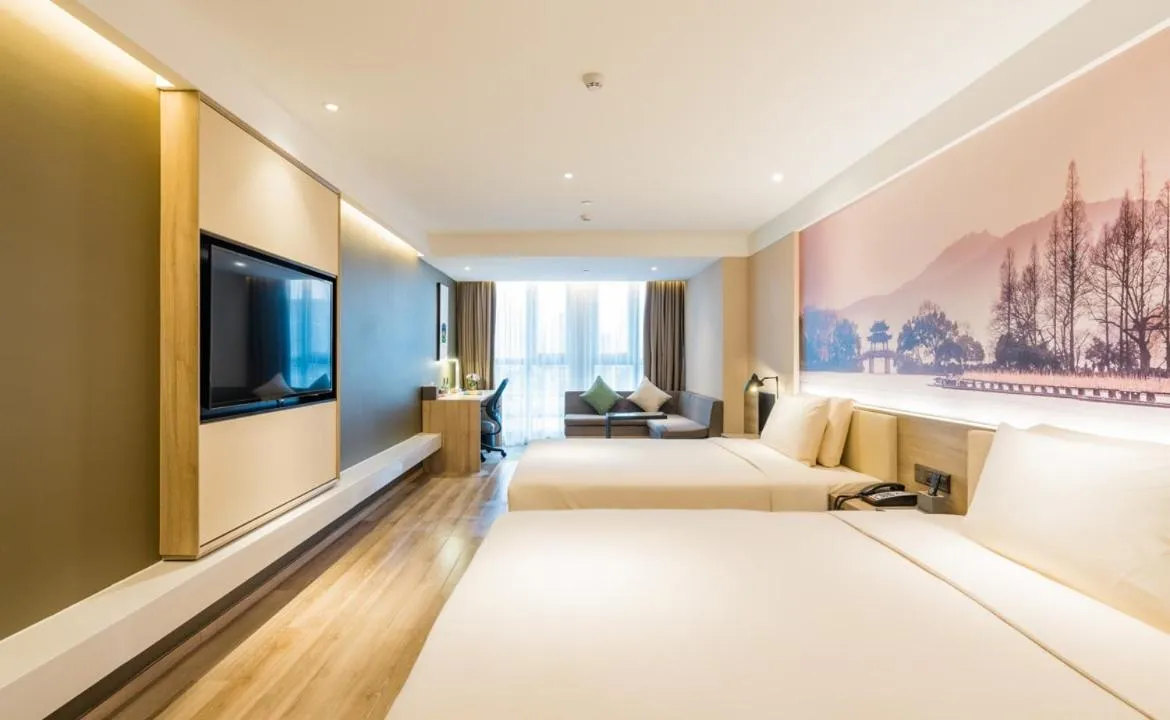 Communal lounge/ TV room, Bed in Atour Hotel Hangzhou West Lake Cultural Plaza Shangtang Road