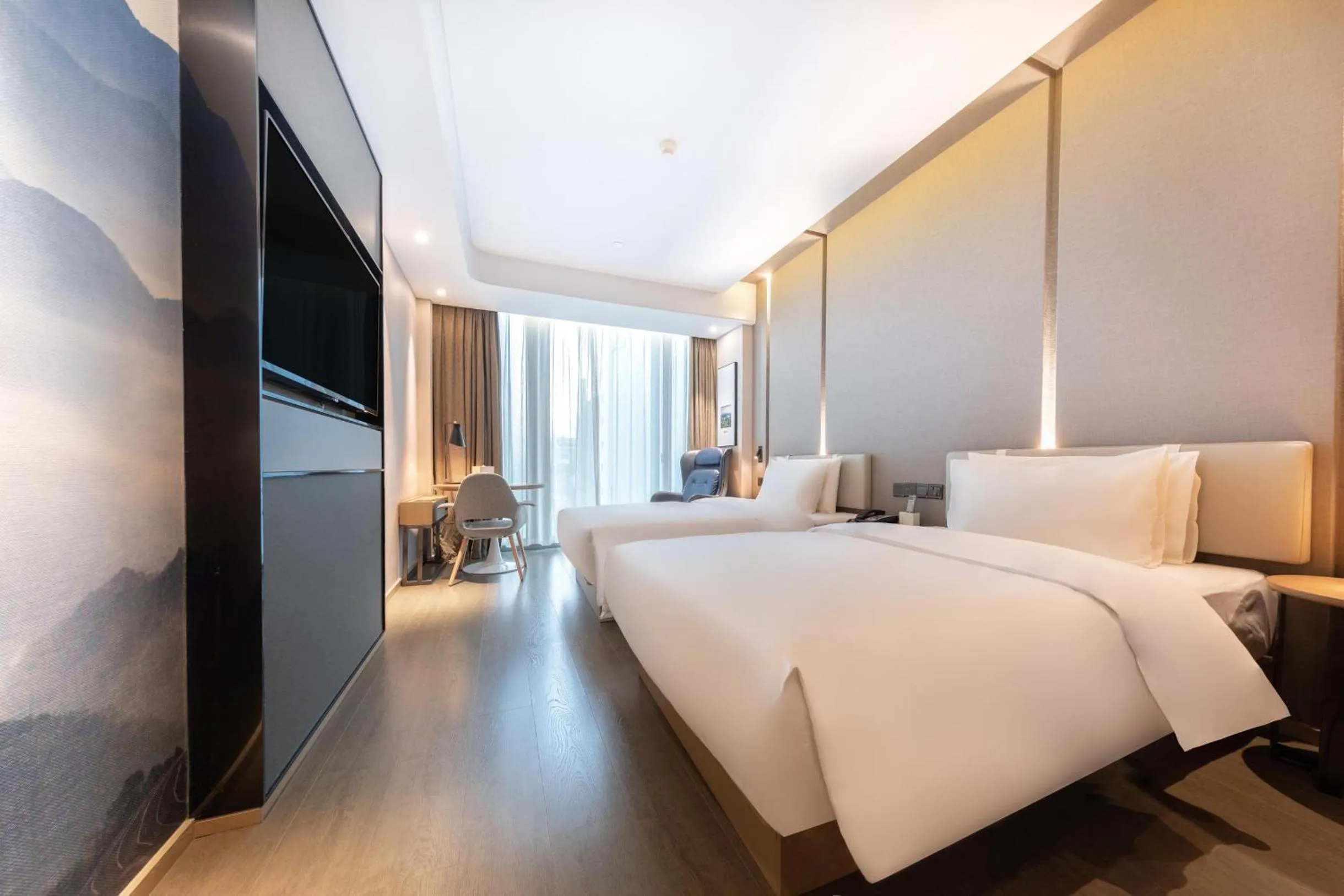Bed in Atour Hotel Ningbo Sanjiangkou Bund Book City