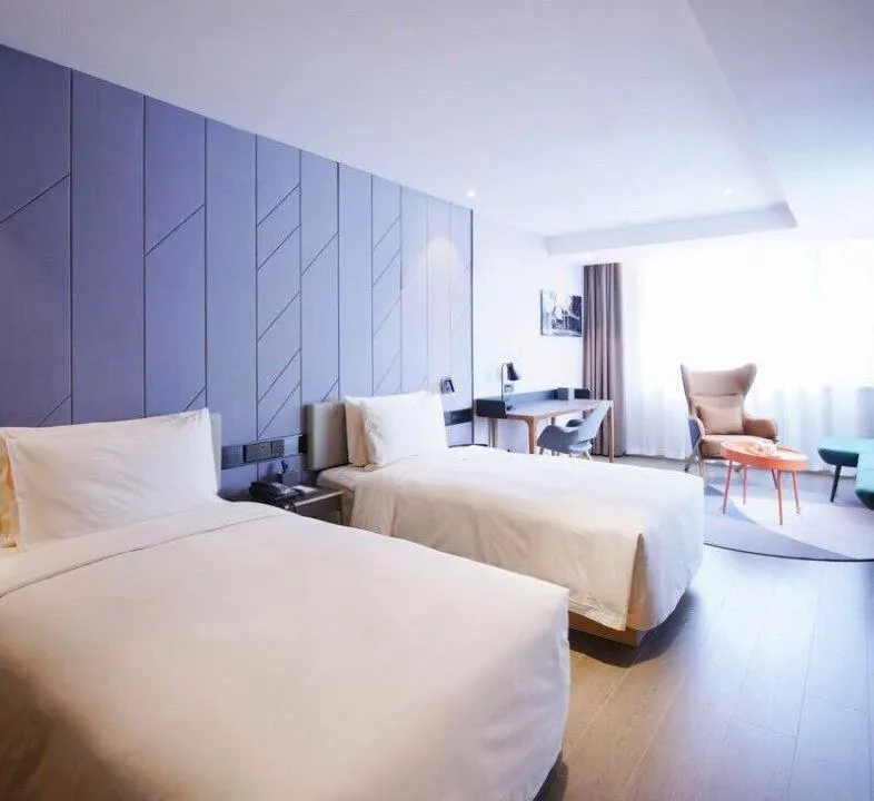 Photo of the whole room, Bed in Atour Hotel Gangding Metro Station Taikoo Hui Tianhe Guangzhou