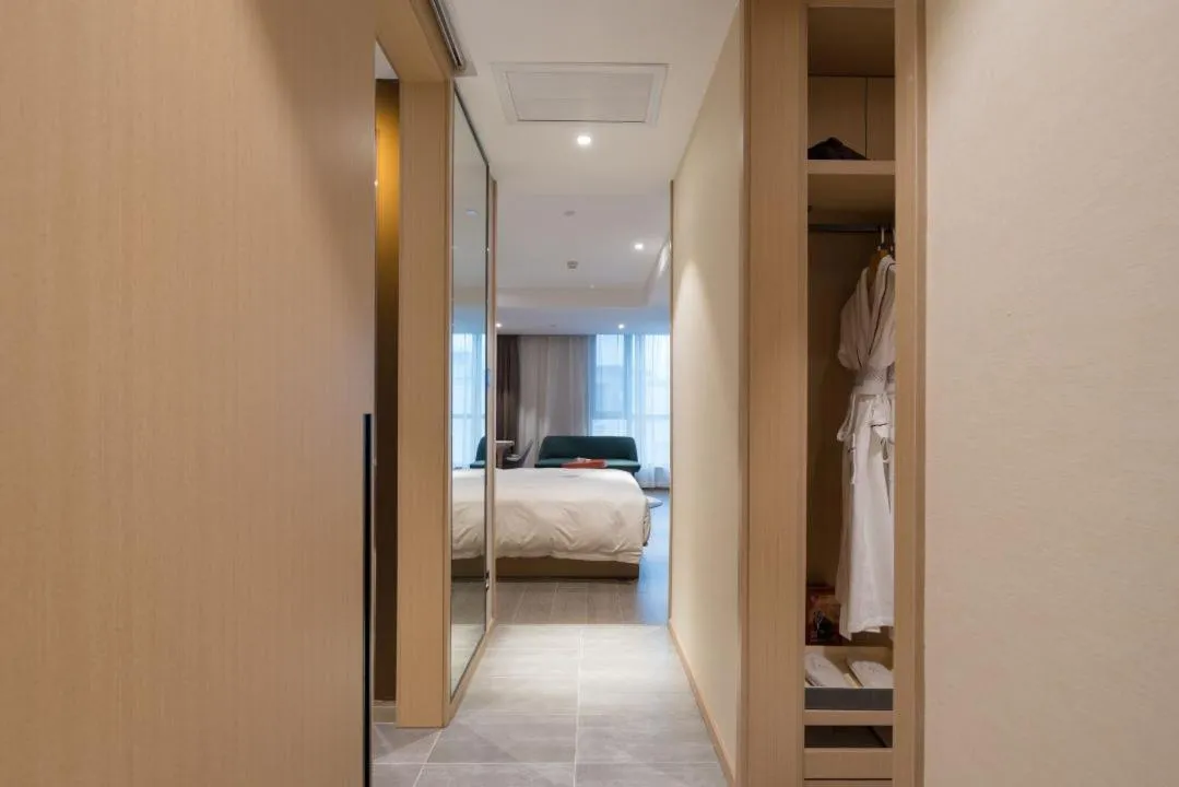 wardrobe, Bed in Atour Hotel Gangding Metro Station Taikoo Hui Tianhe Guangzhou