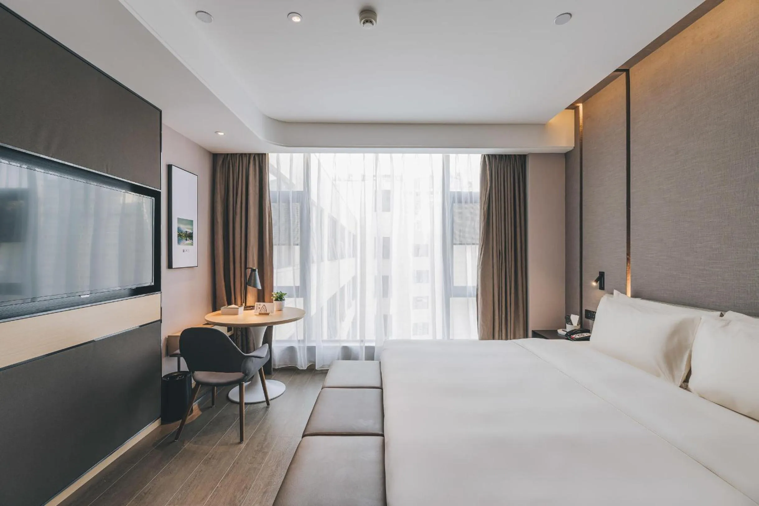 Bed in Atour Hotel Chaozhou Ancient Town People's Square