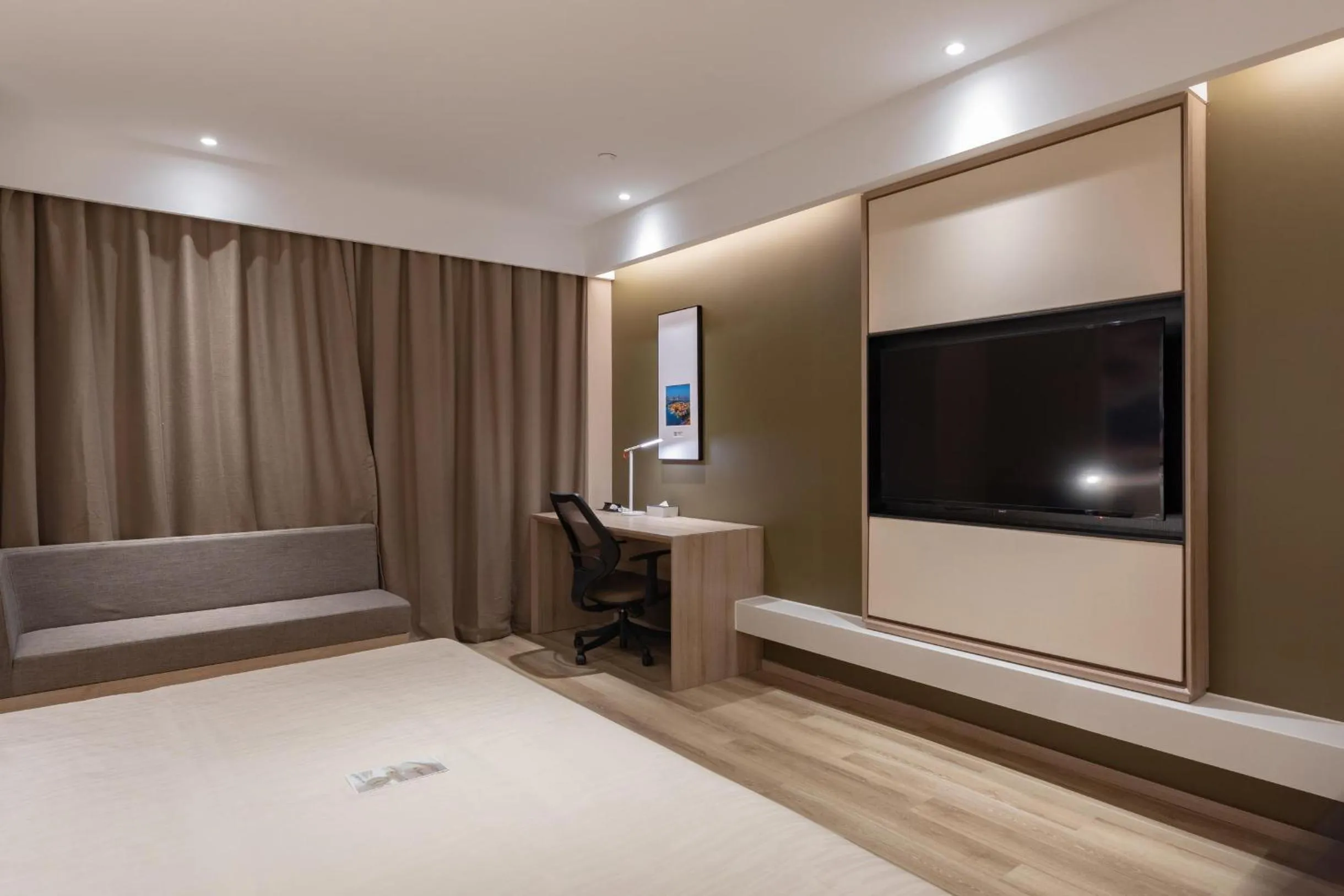 Bed in Atour Hotel Chaozhou Ancient Town People's Square