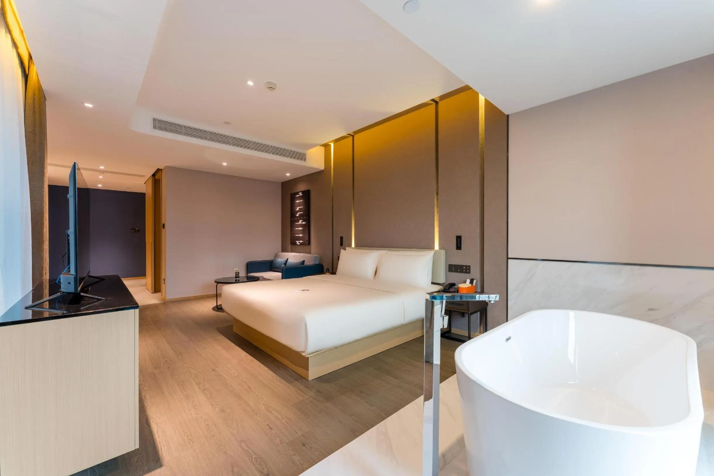 Seating area, Bed in Atour Hotel Chongqing Tiandi NetEase Cloud Music