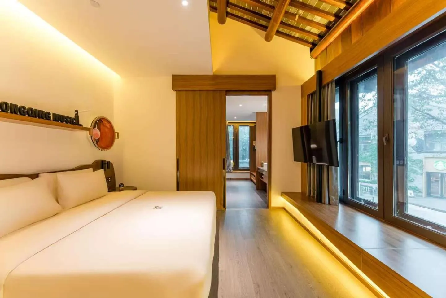 Communal lounge/ TV room, Bed in Atour Hotel Chongqing Tiandi NetEase Cloud Music