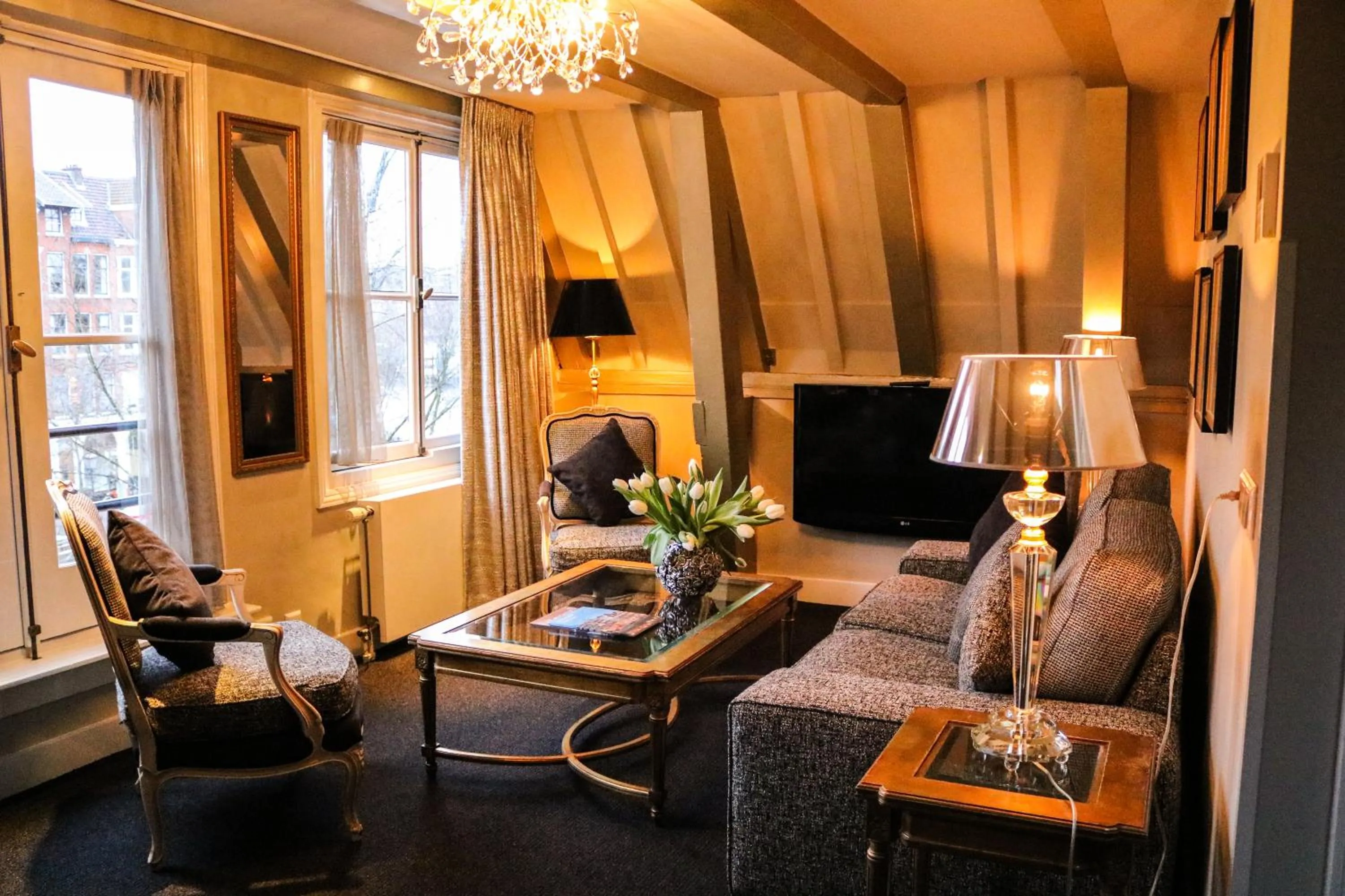 Seating area in Ambassade Hotel