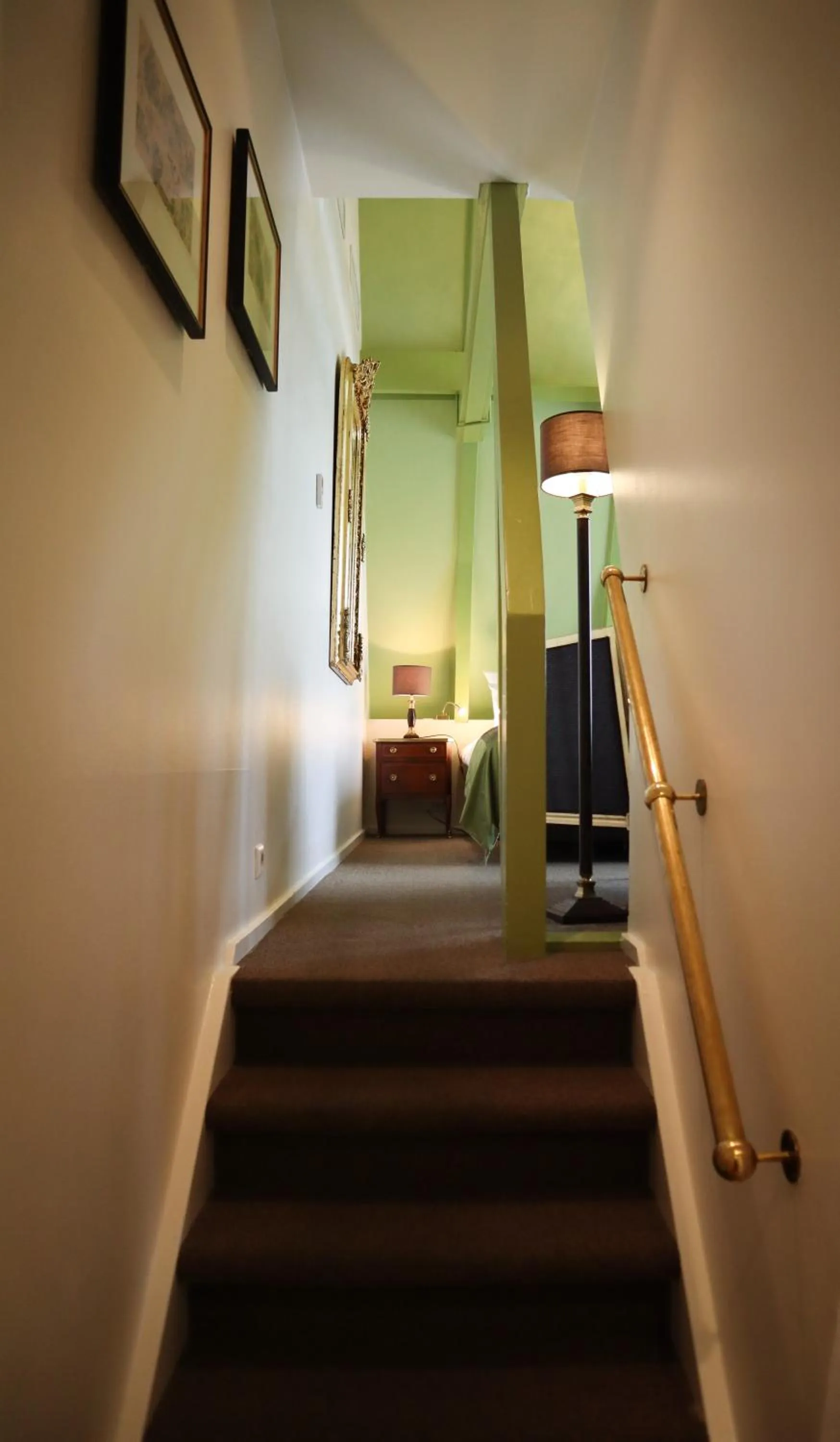 Bedroom in Ambassade Hotel