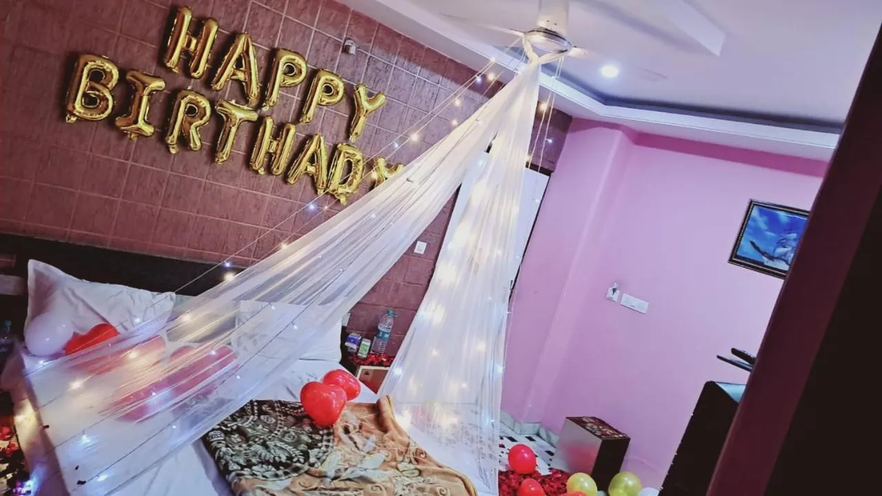 Bed in HOTEL HAYAT RESIDENCY