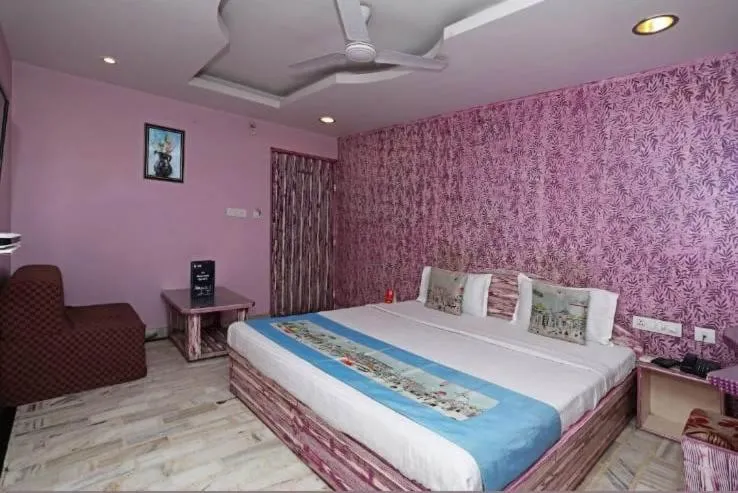 Bed in HOTEL HAYAT RESIDENCY