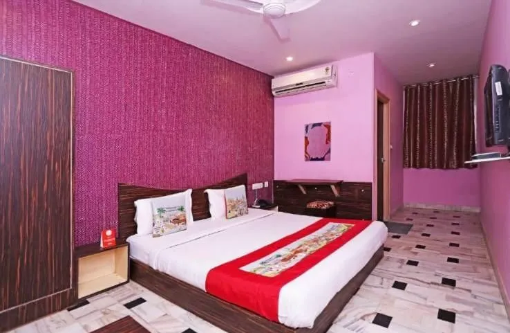 Bed in HOTEL HAYAT RESIDENCY