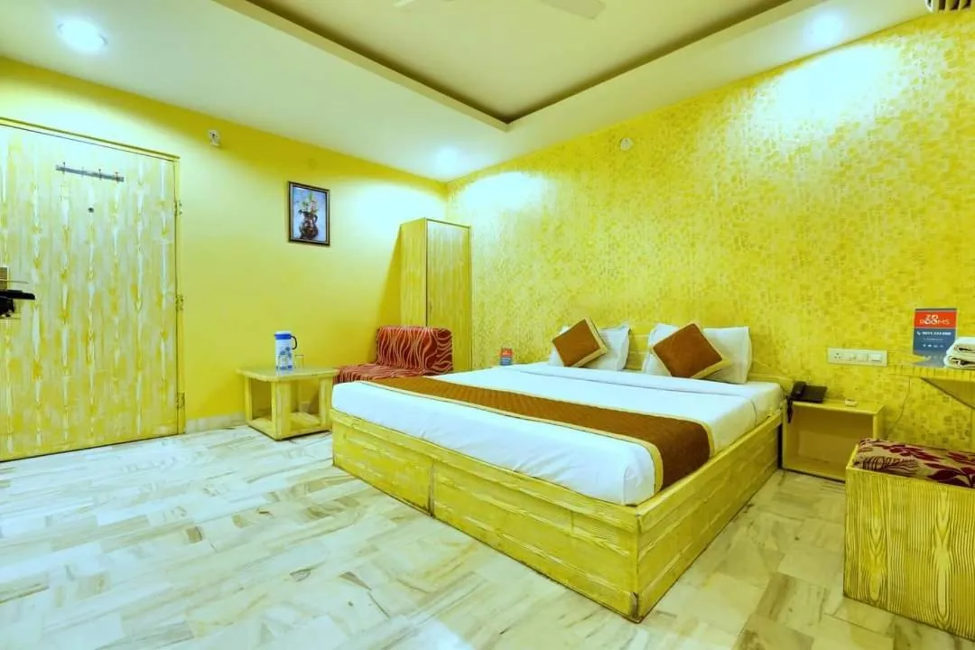 Bed in HOTEL HAYAT RESIDENCY