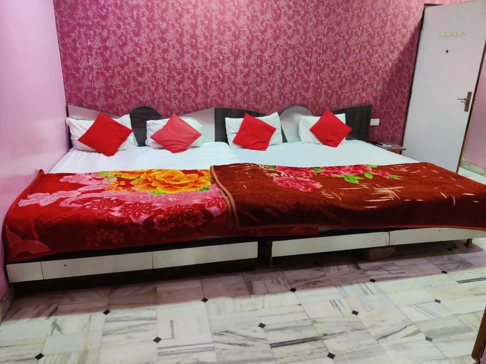 Bed in HOTEL HAYAT RESIDENCY