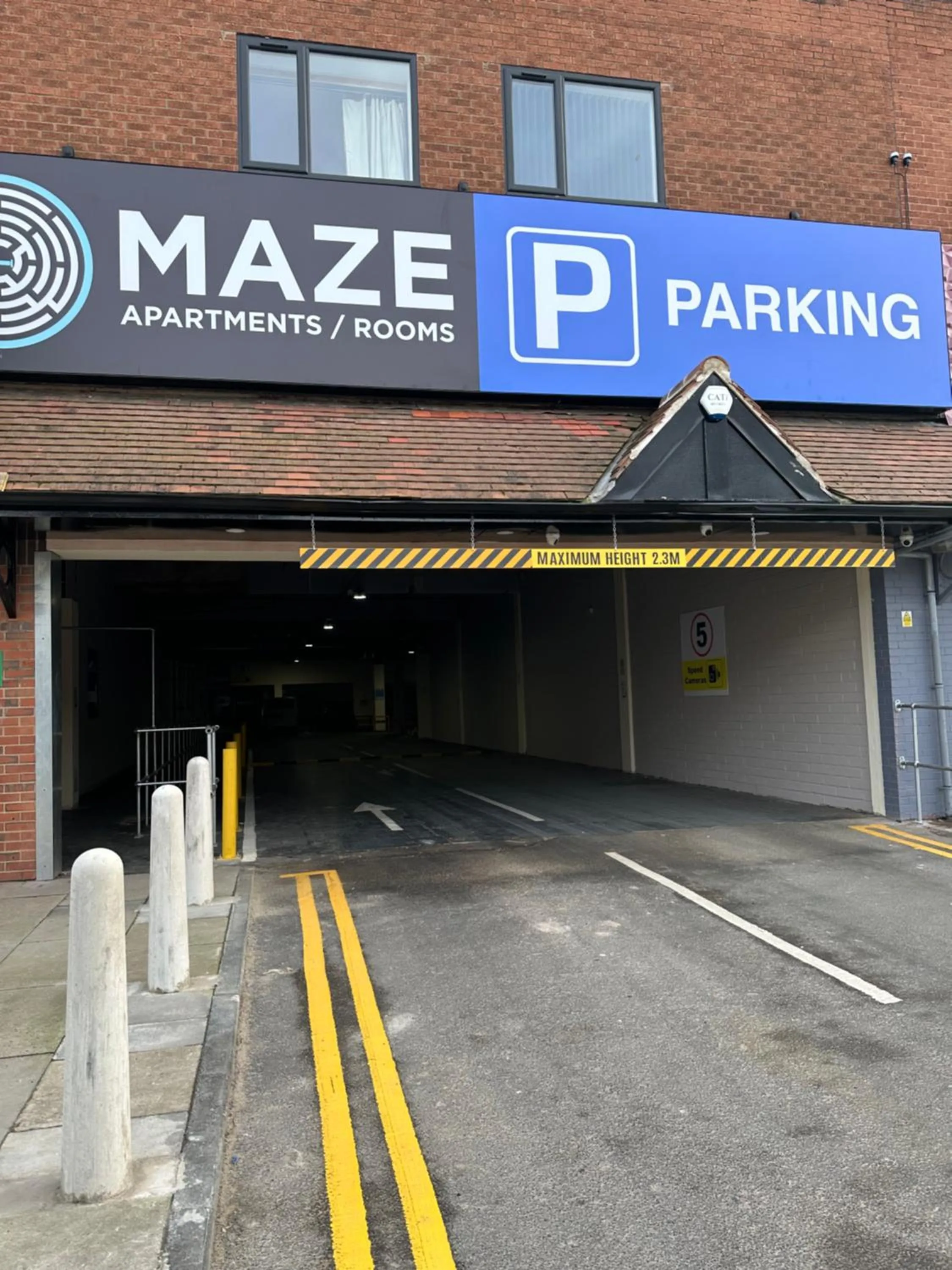 Property logo or sign in Maze apartments and rooms Free parking