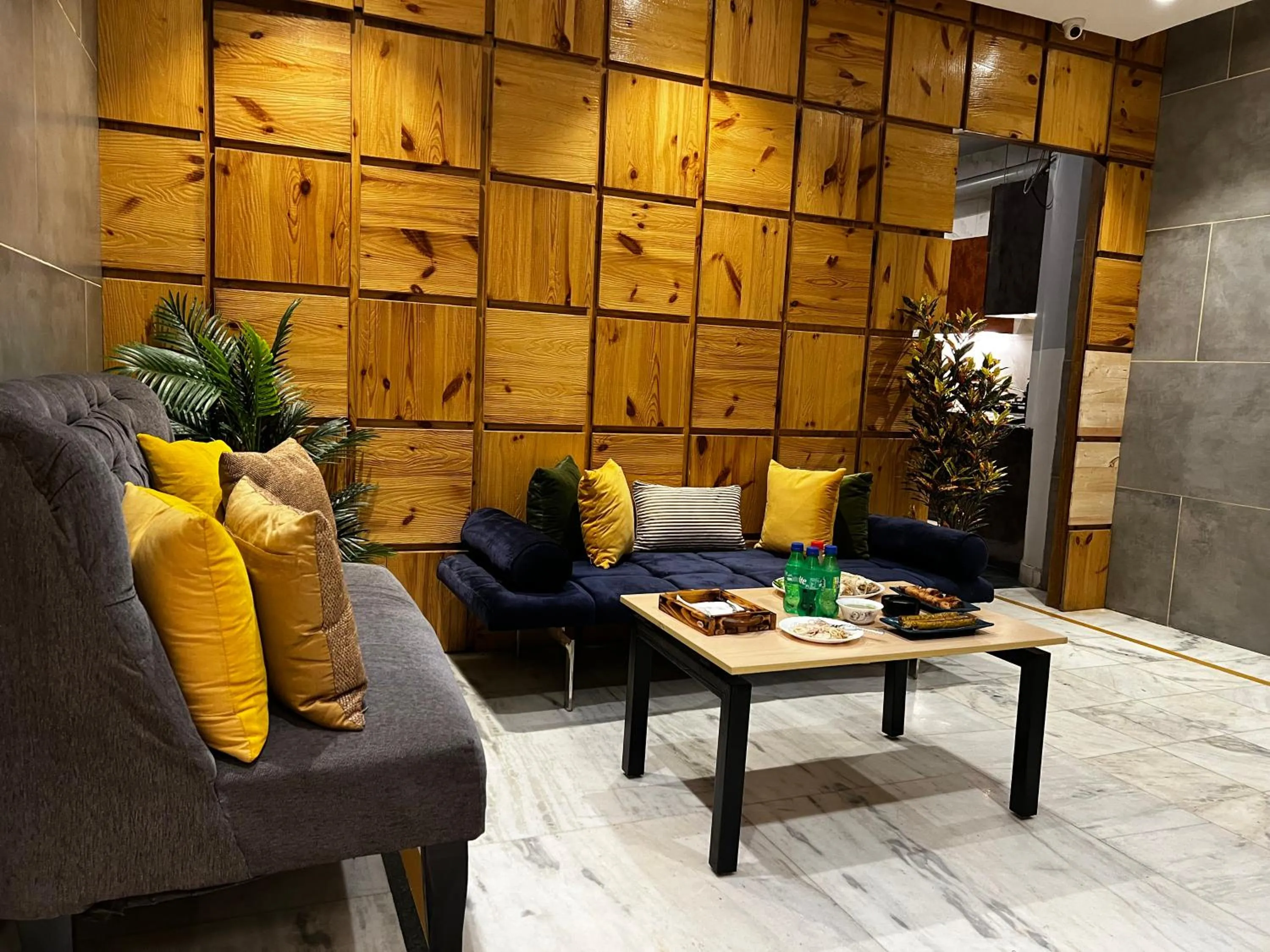 Dining area in Divine Inn Hotel Near Rajouri Garden Main Market