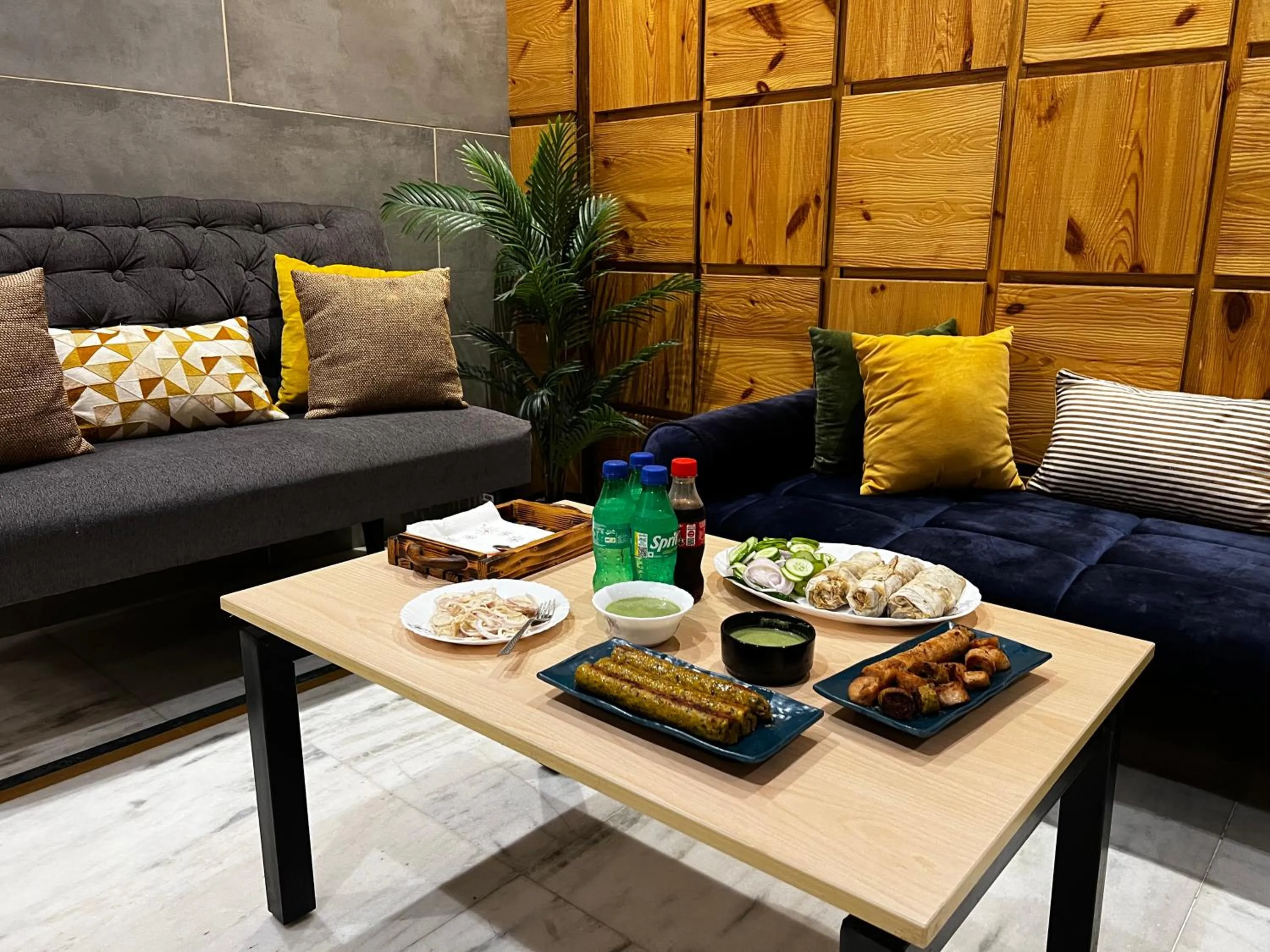 Dining area in Divine Inn Hotel Near Rajouri Garden Main Market