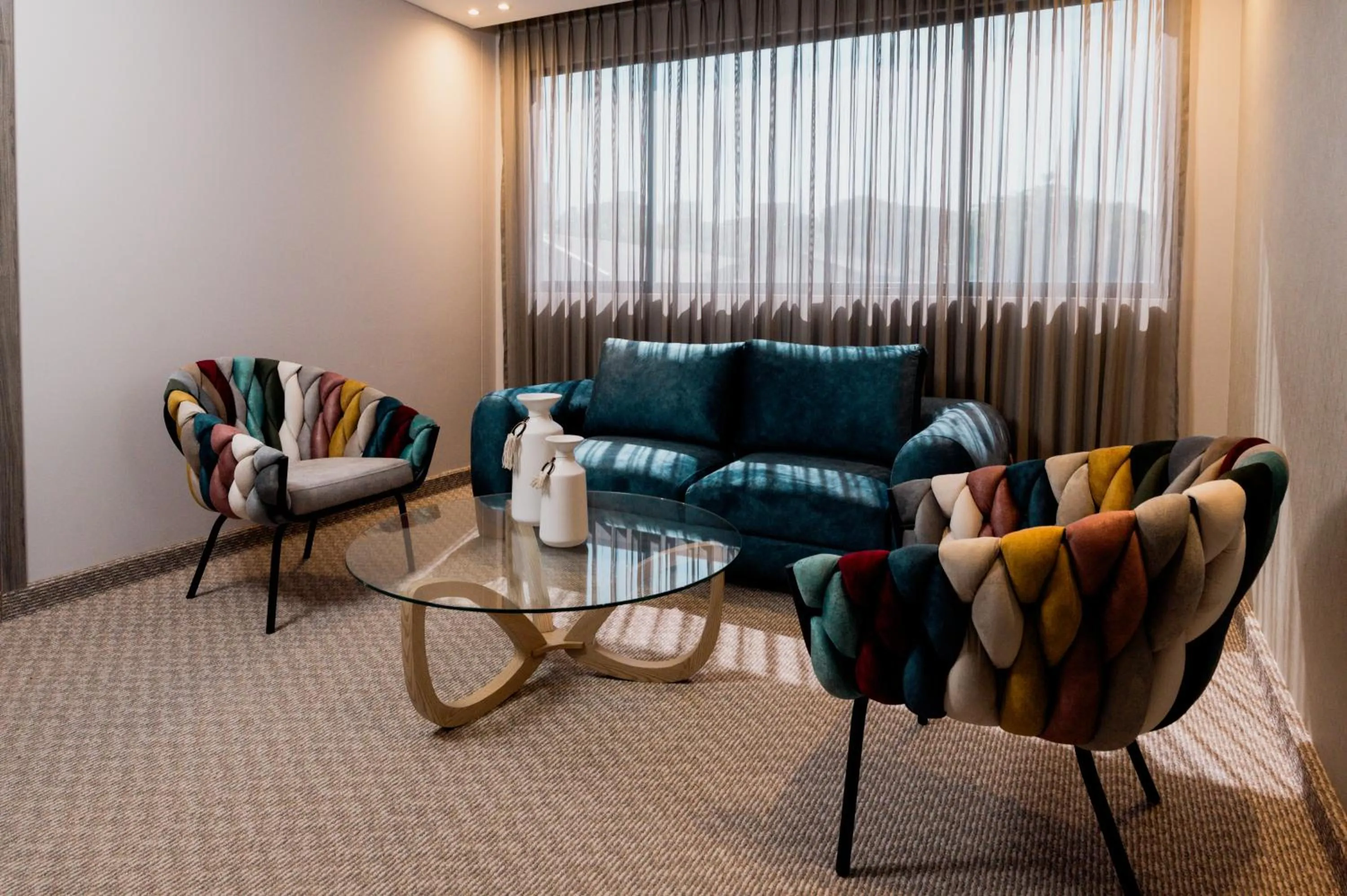 Seating area in Amari Living Suites