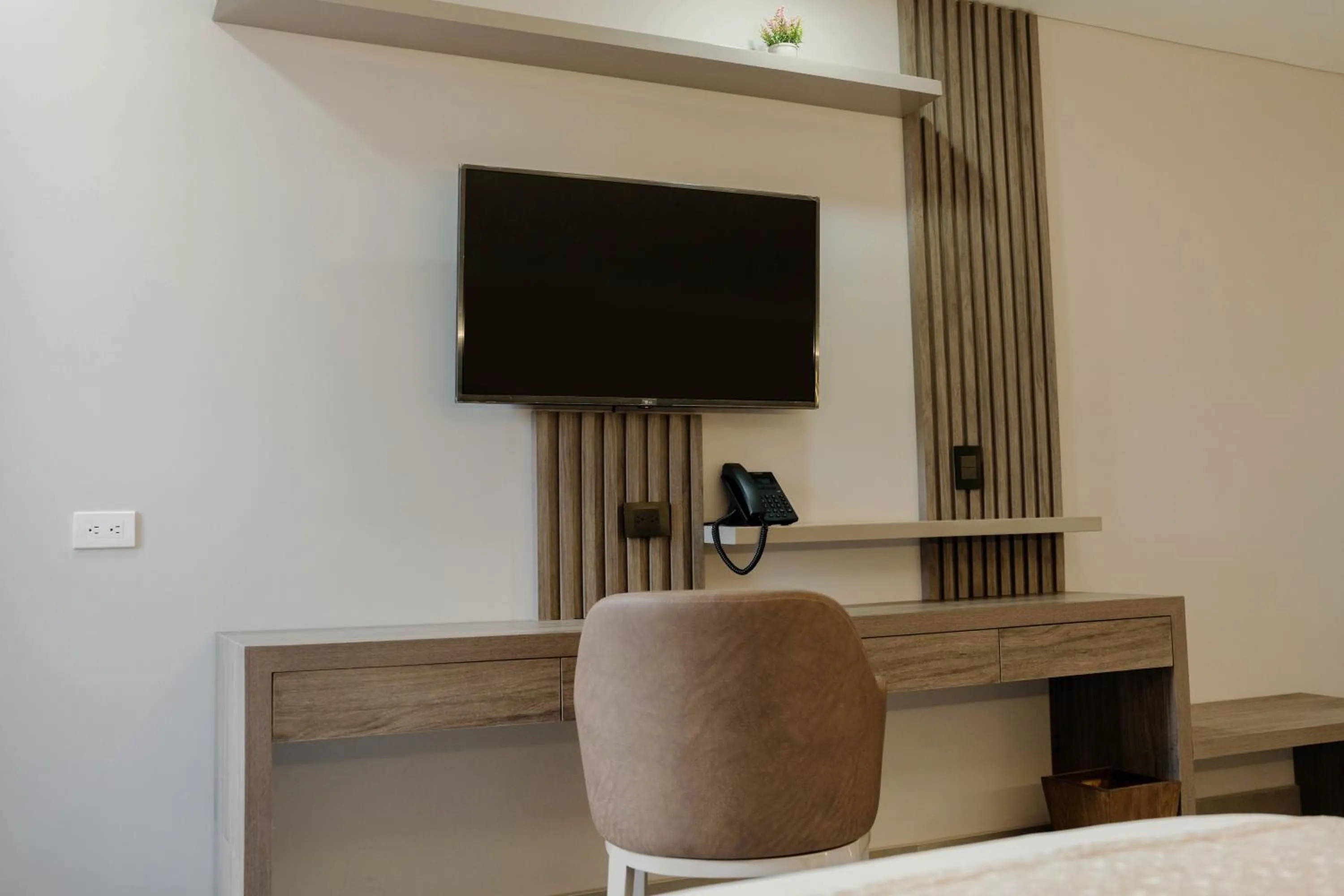 TV and multimedia in Amari Living Suites