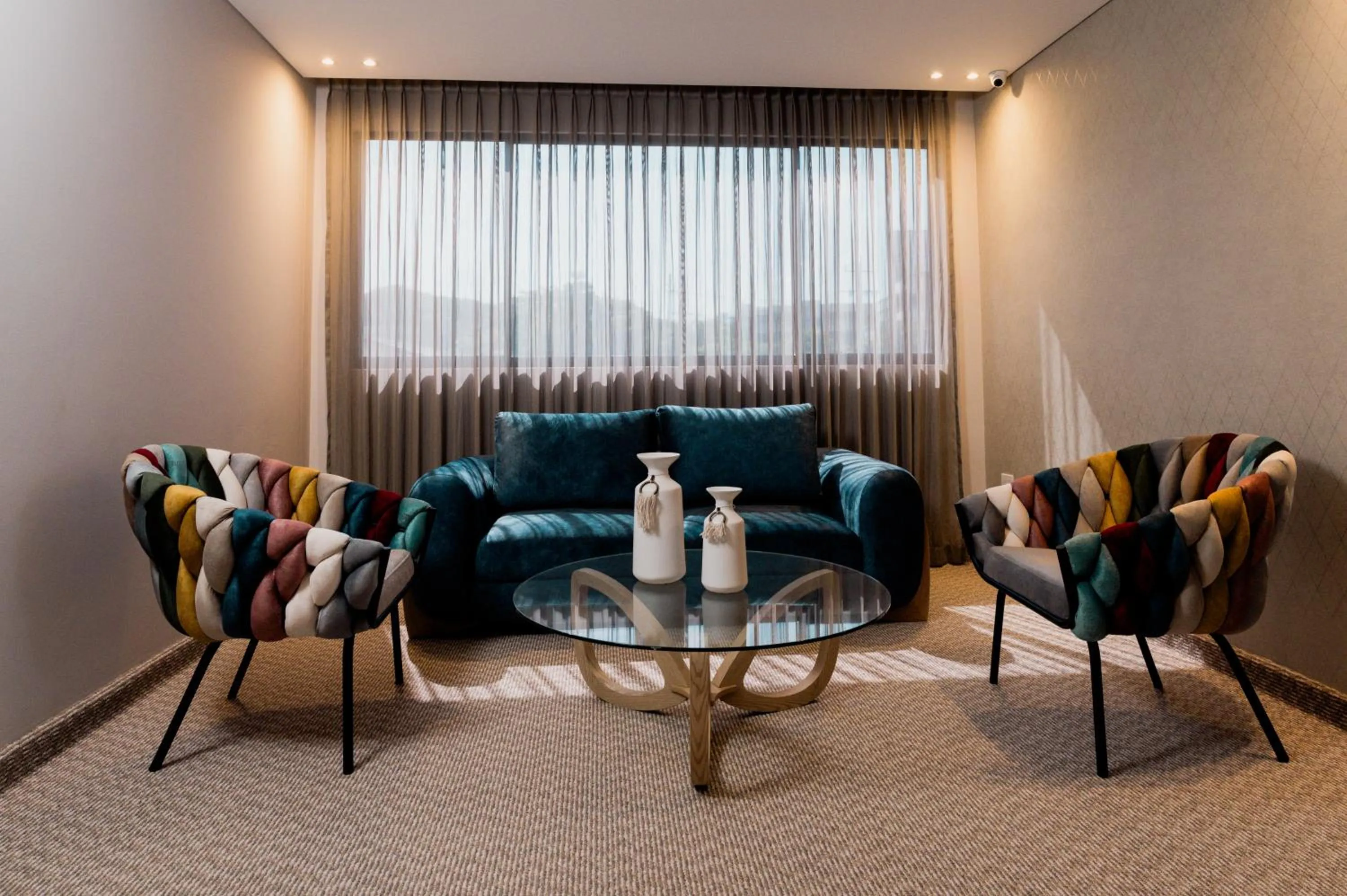 Seating area in Amari Living Suites