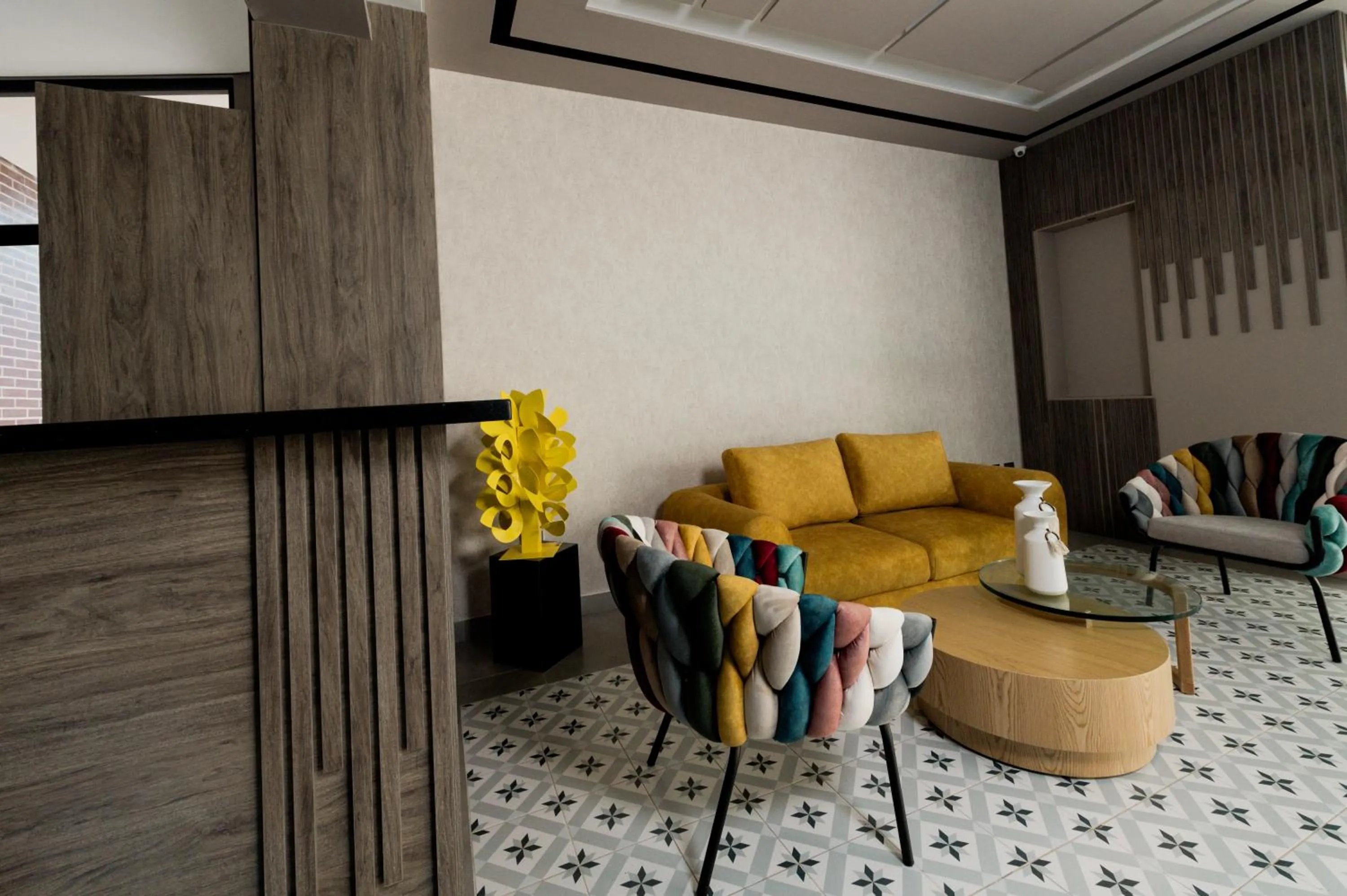 Communal lounge/ TV room in Amari Living Suites