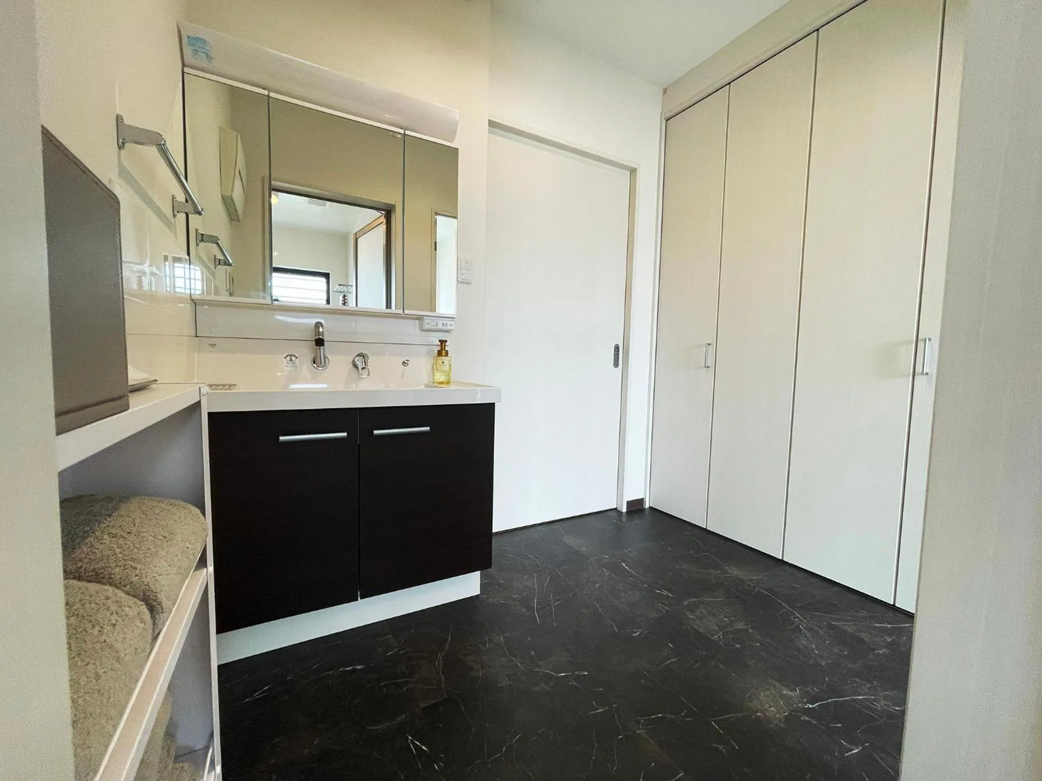 Bathroom in ＆Monde. Okinawa Arena Condominium