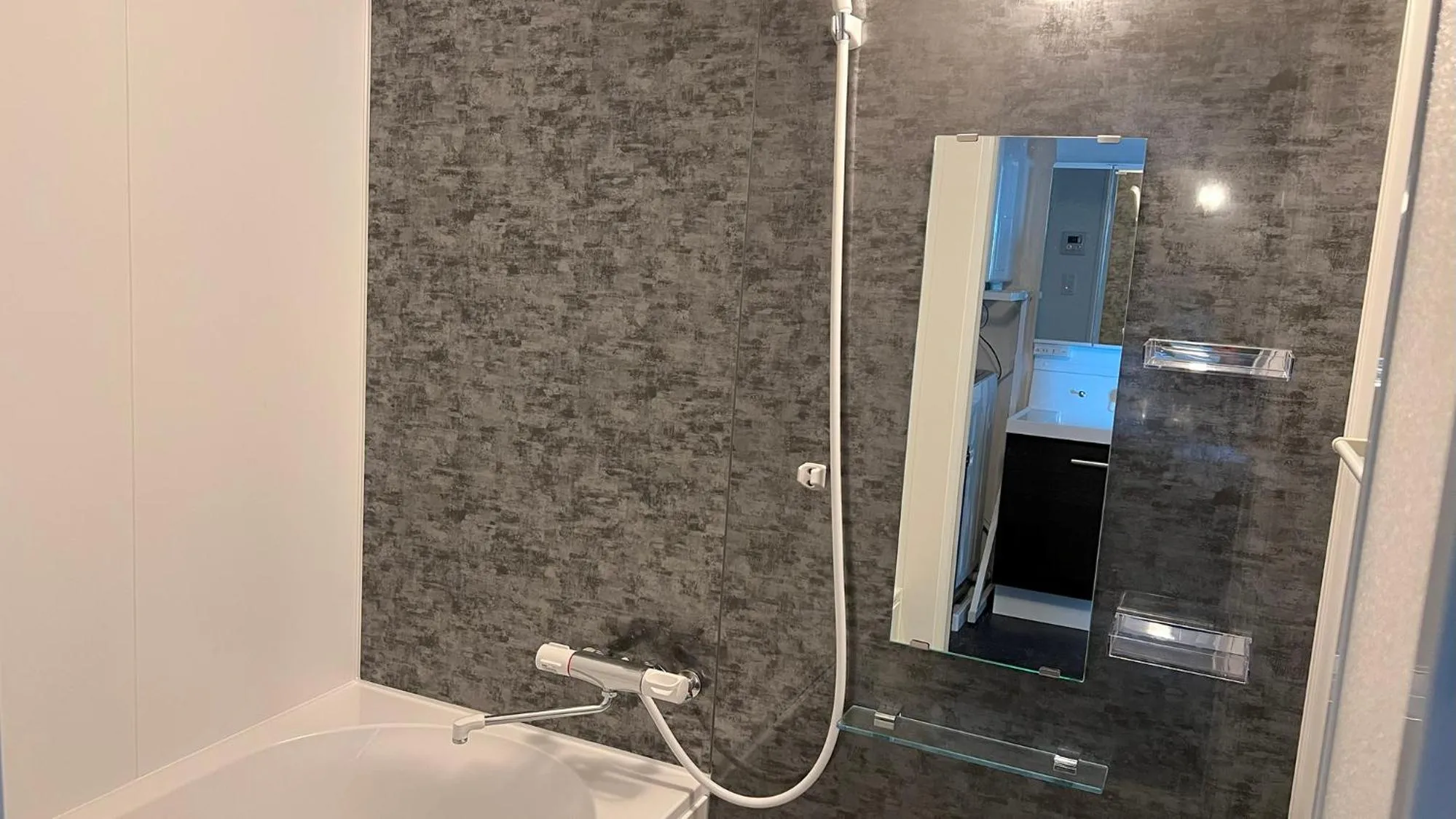 Bathroom in ＆Monde. Okinawa Arena Condominium