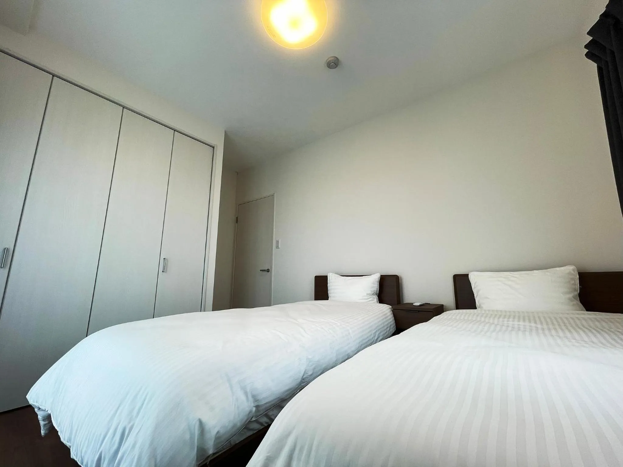 Bed in ＆Monde. Okinawa Arena Condominium