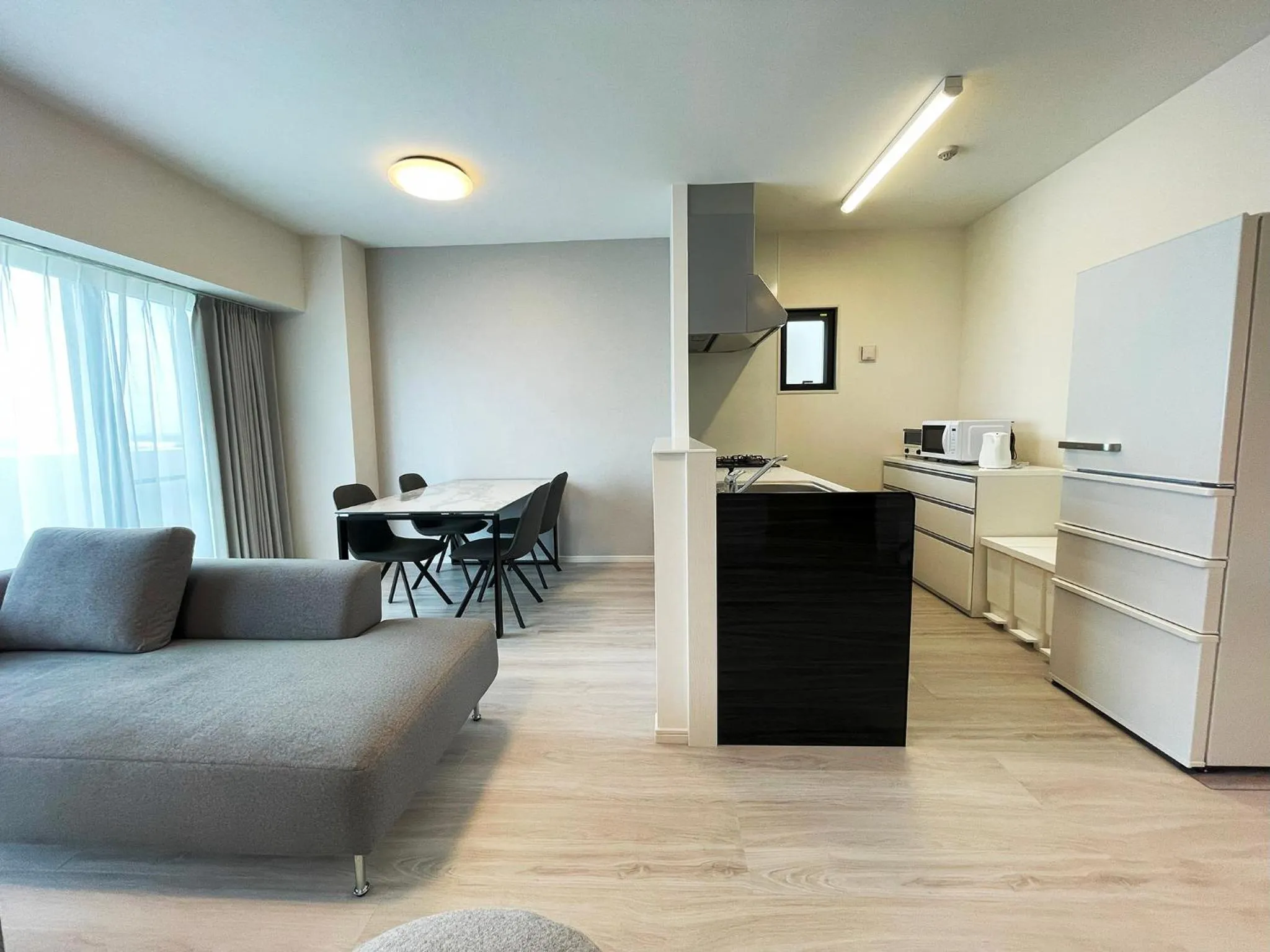 Living room in ＆Monde. Okinawa Arena Condominium