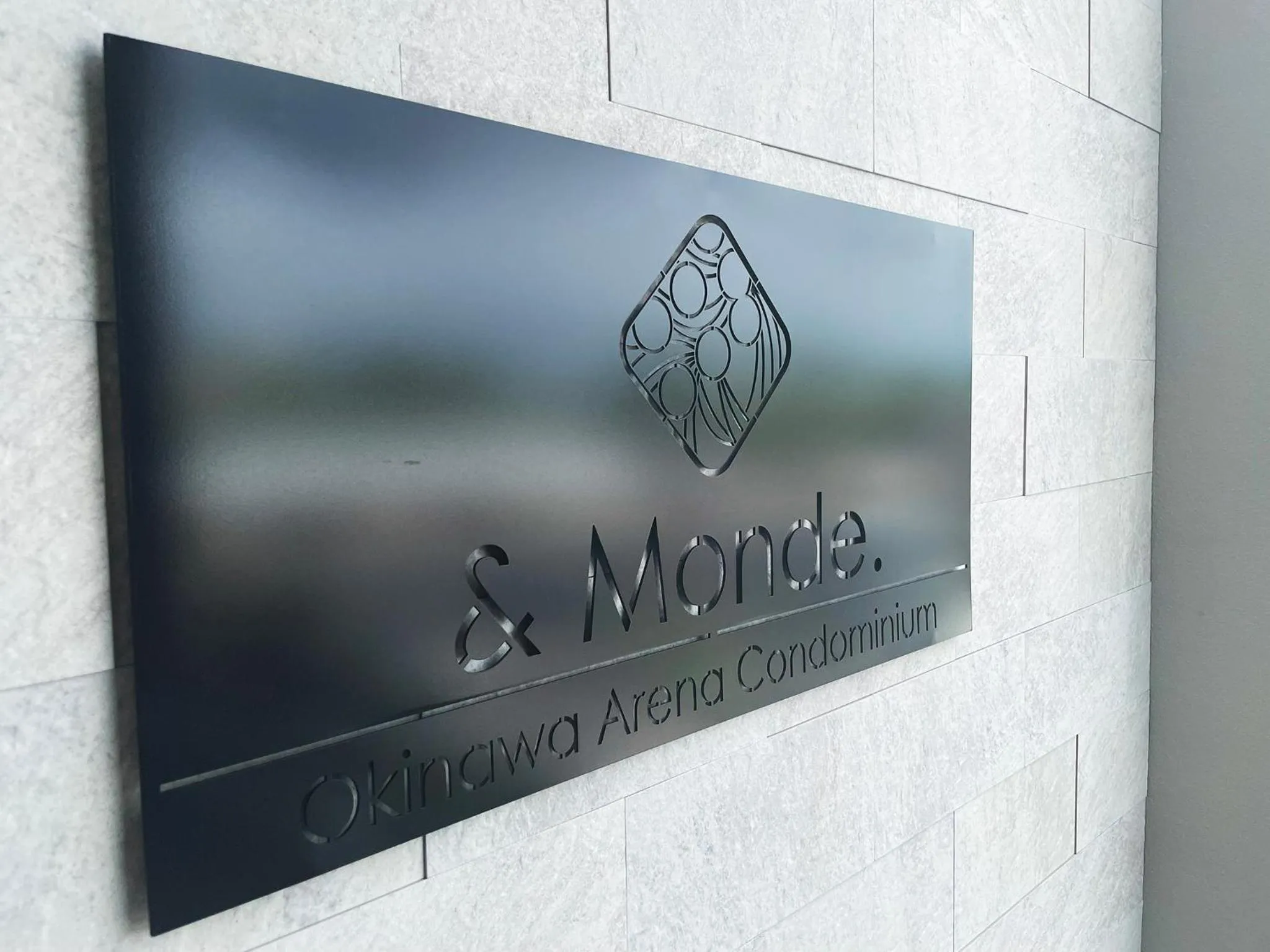 Property building in ＆Monde. Okinawa Arena Condominium