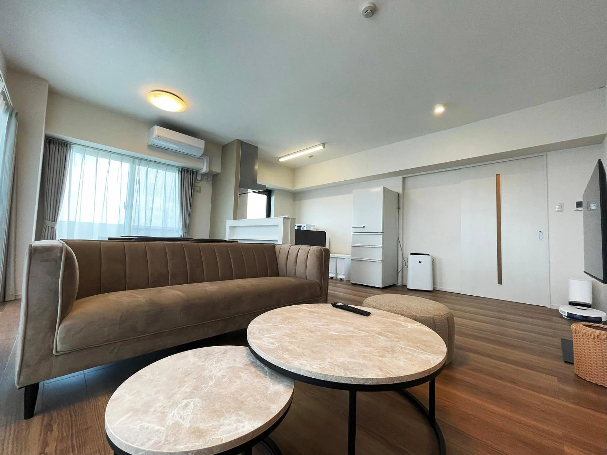 Living room in ＆Monde. Okinawa Arena Condominium