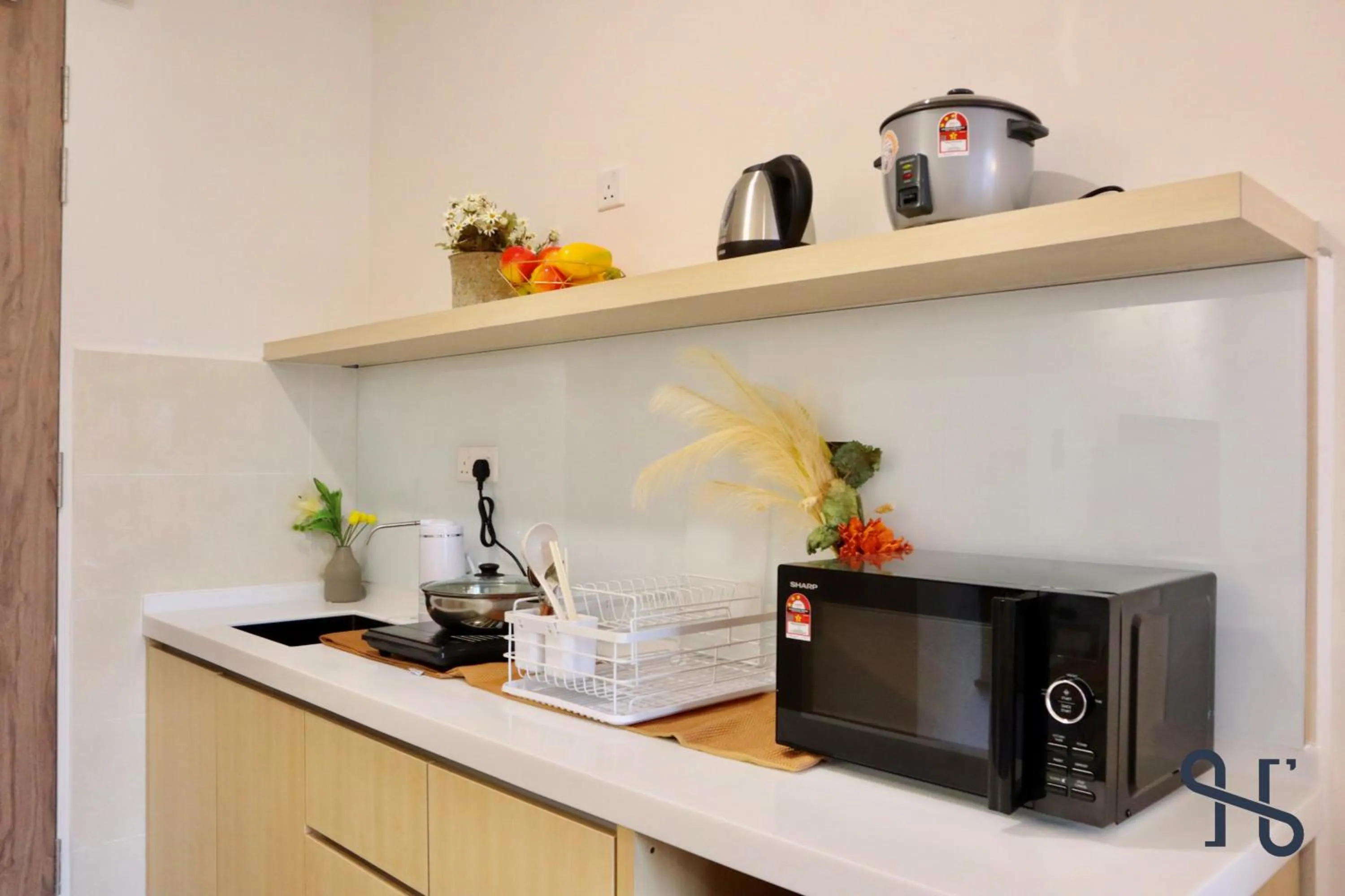 Kitchen or kitchenette in The Shore by Homesuite'