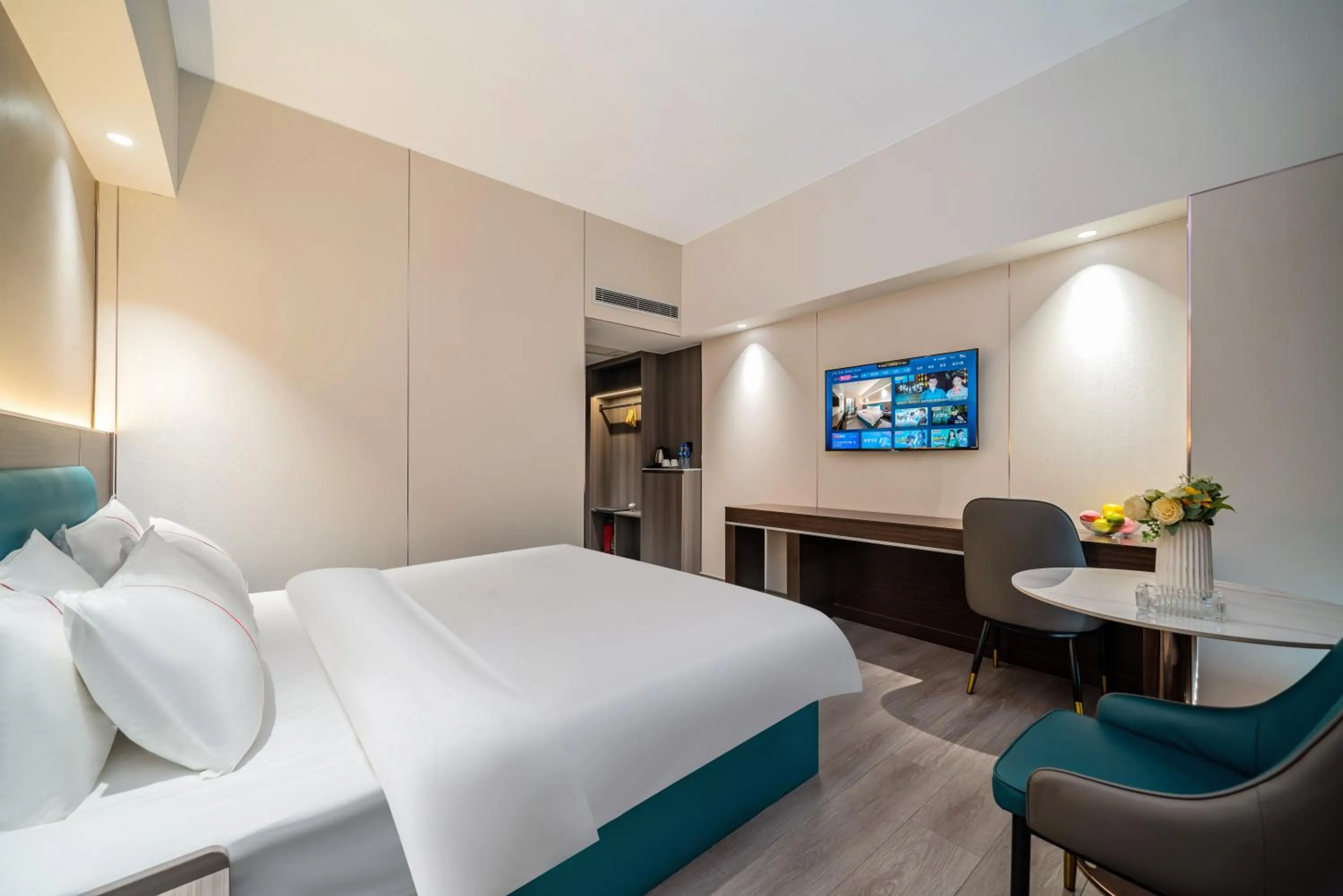 Living room, Bed in Mei Gang Hotel