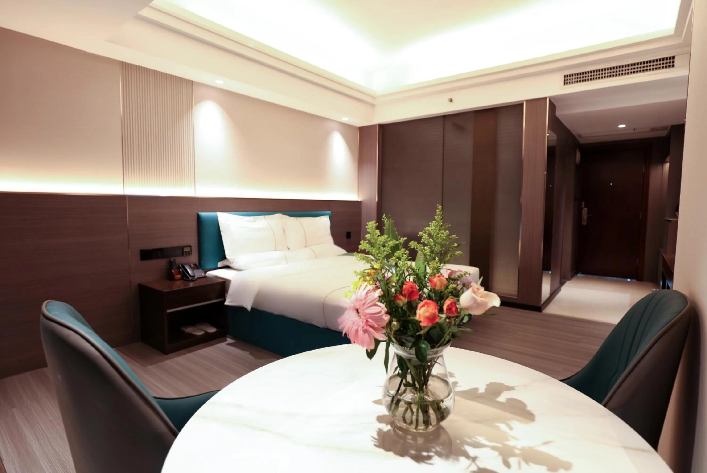 Living room, Bed in Mei Gang Hotel