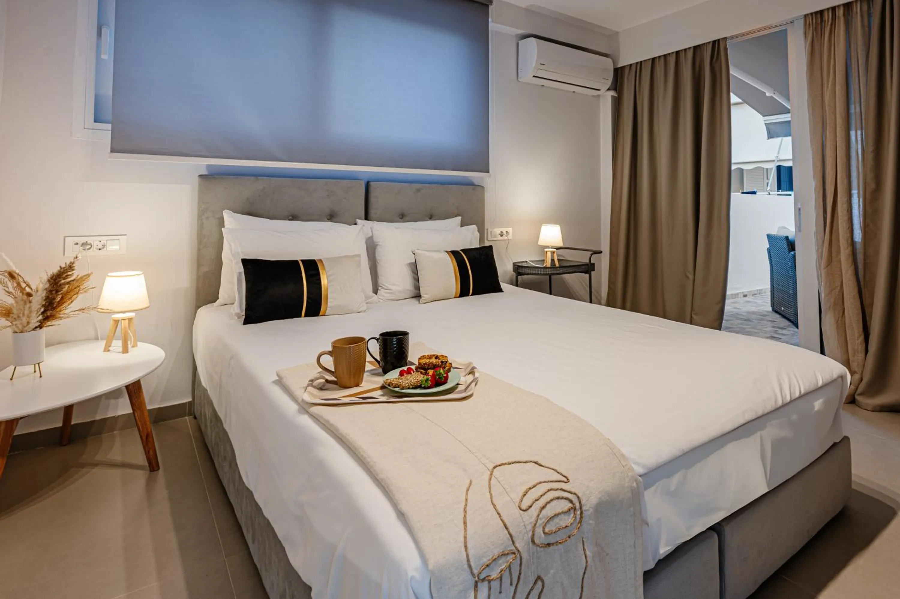 Bed in AMINA APARTMENTS