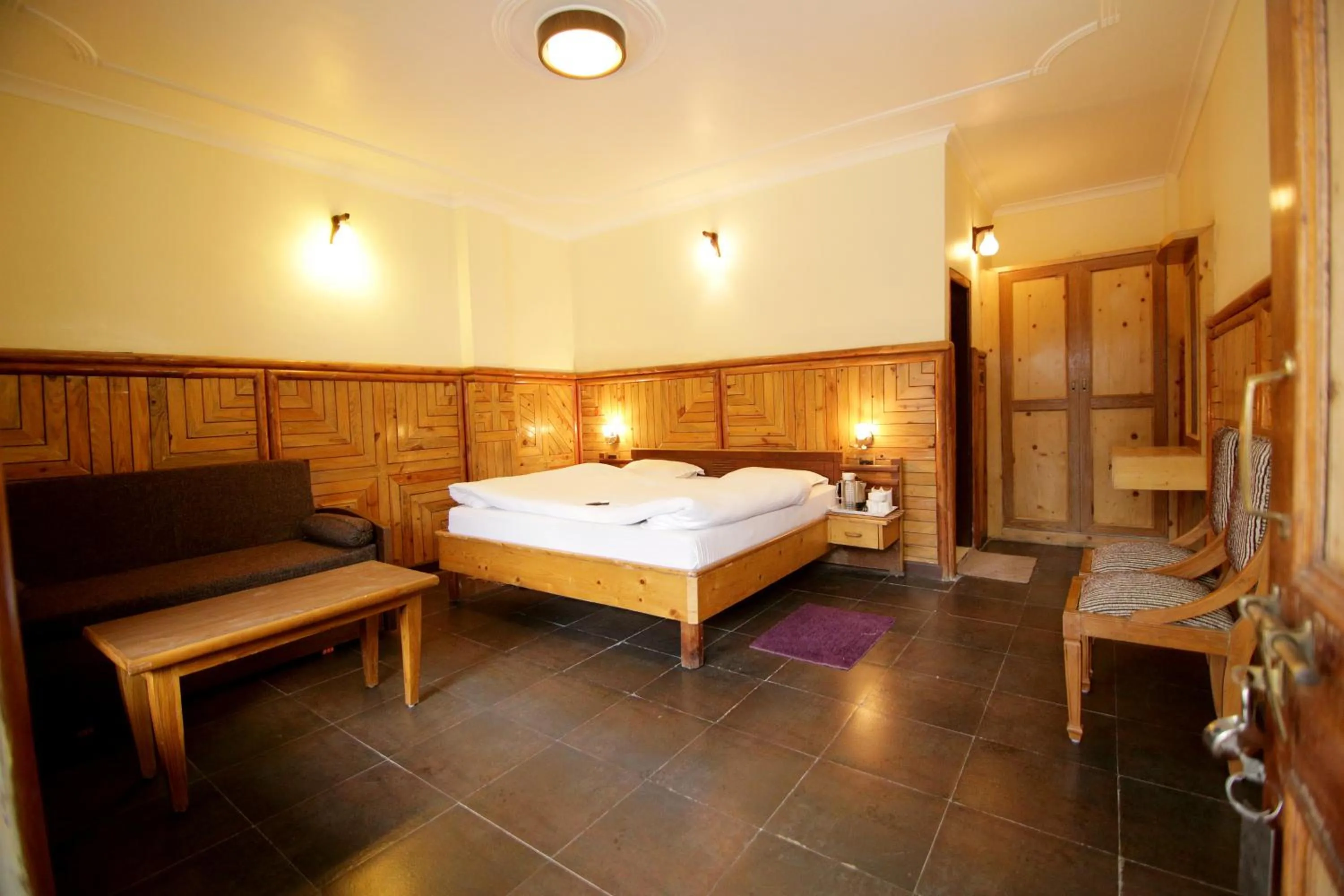 Bedroom in Ashoka Naini Chalet