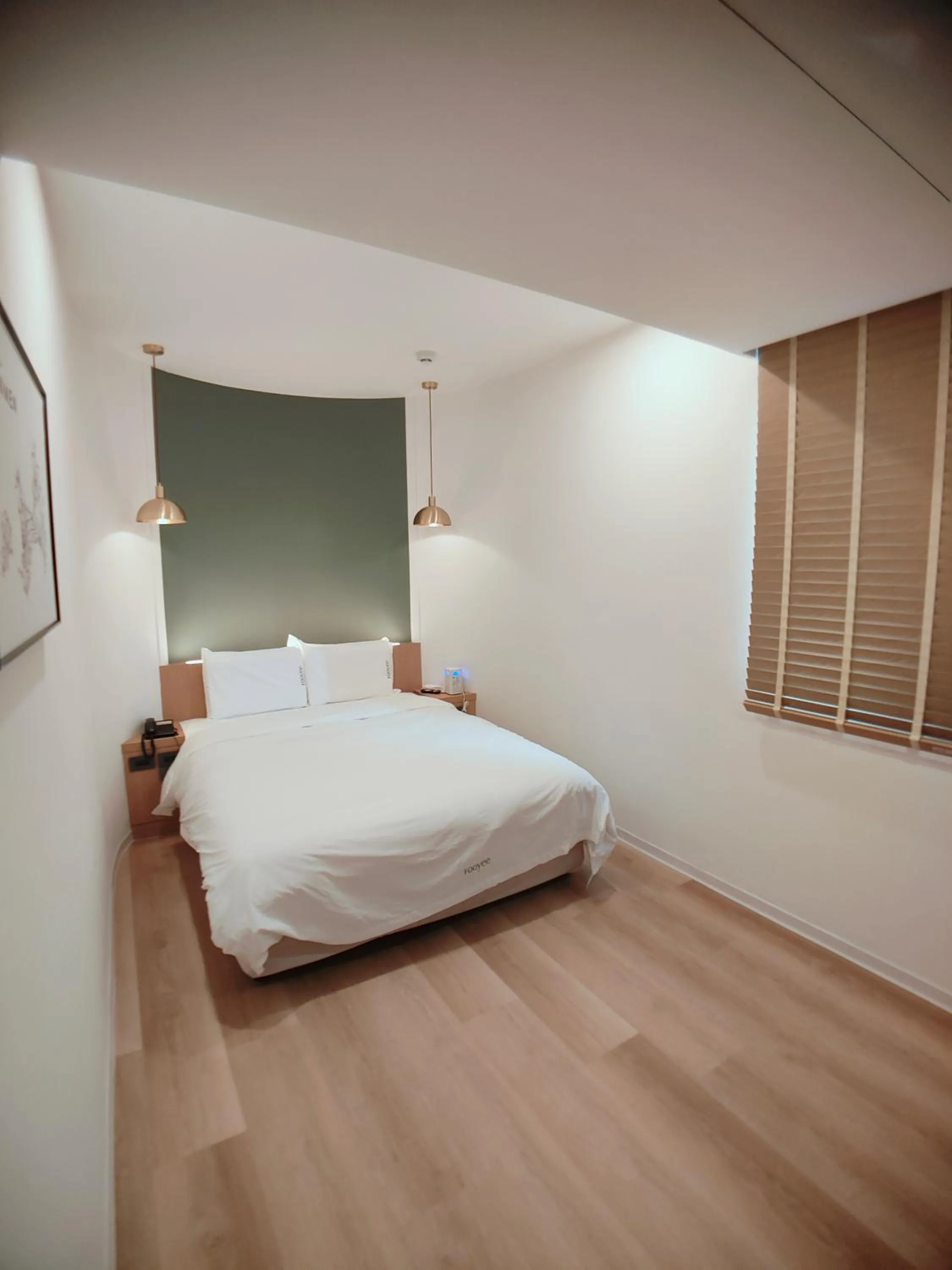 Bed in Fooyee Hotel Wenxin Zhongqing