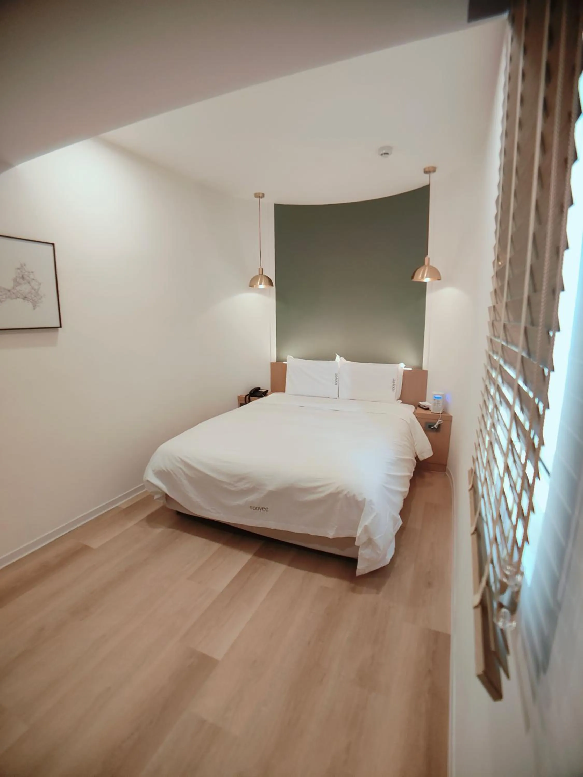 Bed in Fooyee Hotel Wenxin Zhongqing