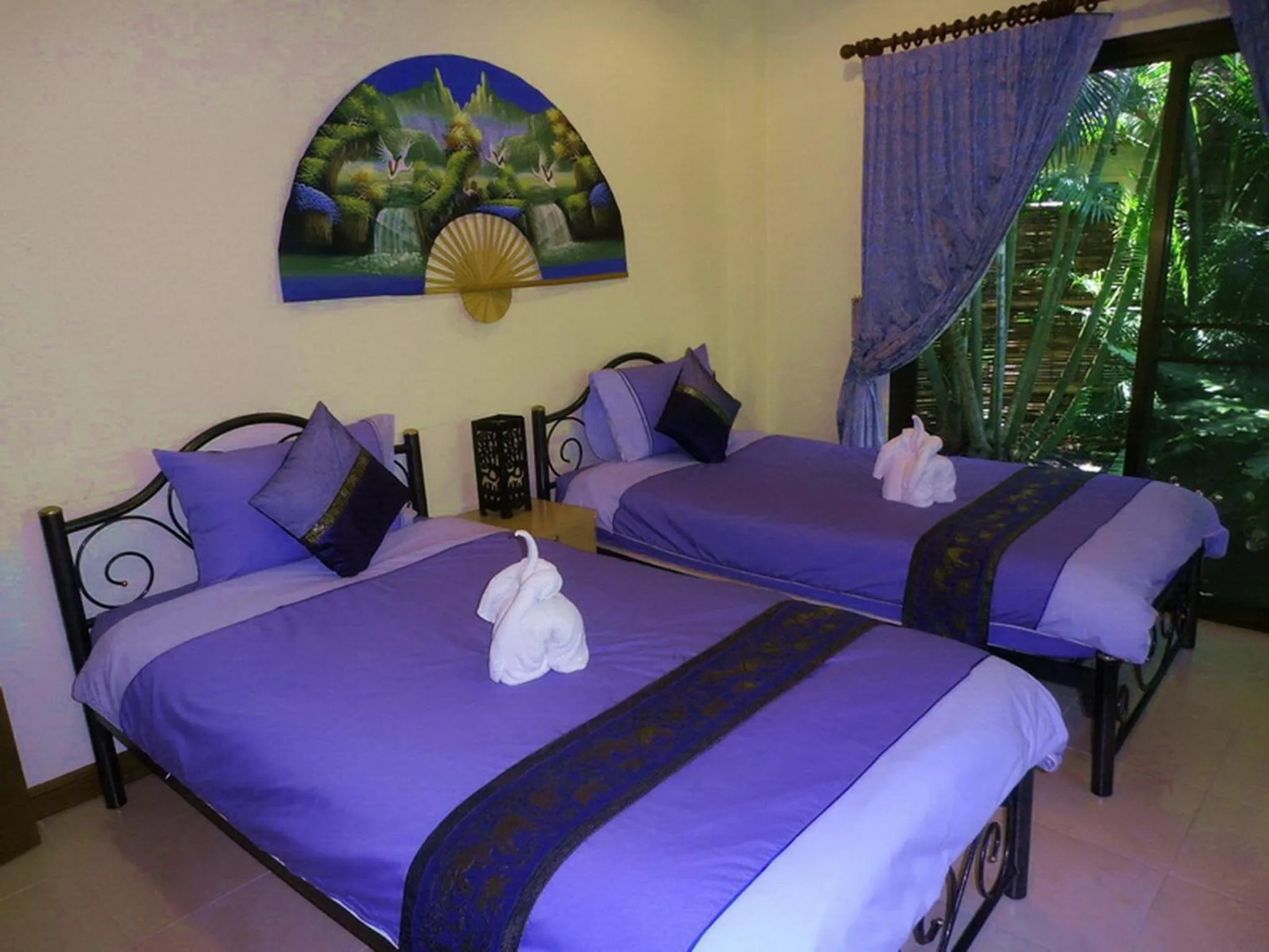 Bedroom in Coconut Paradise Holiday Villas