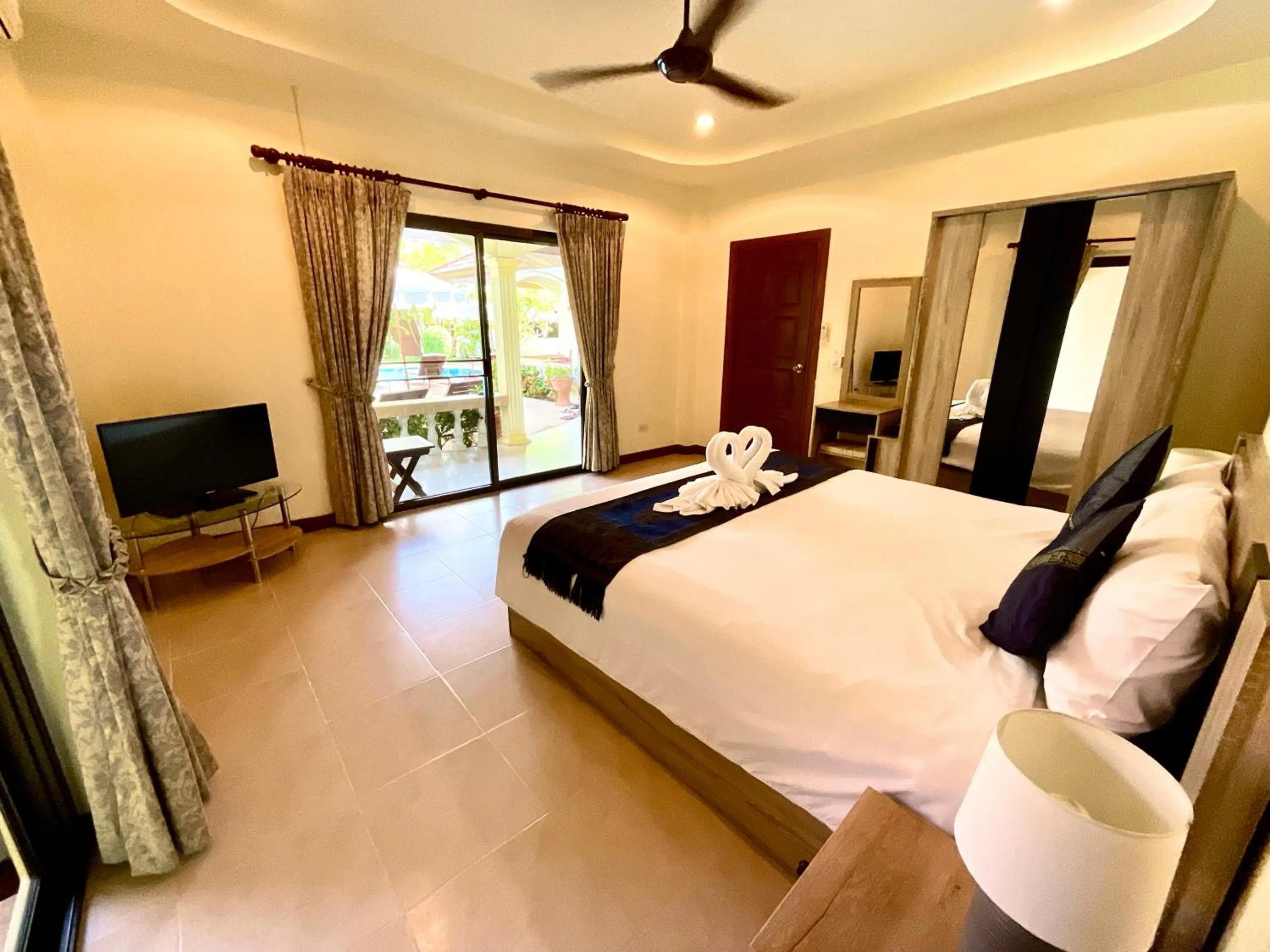 Bedroom in Coconut Paradise Holiday Villas