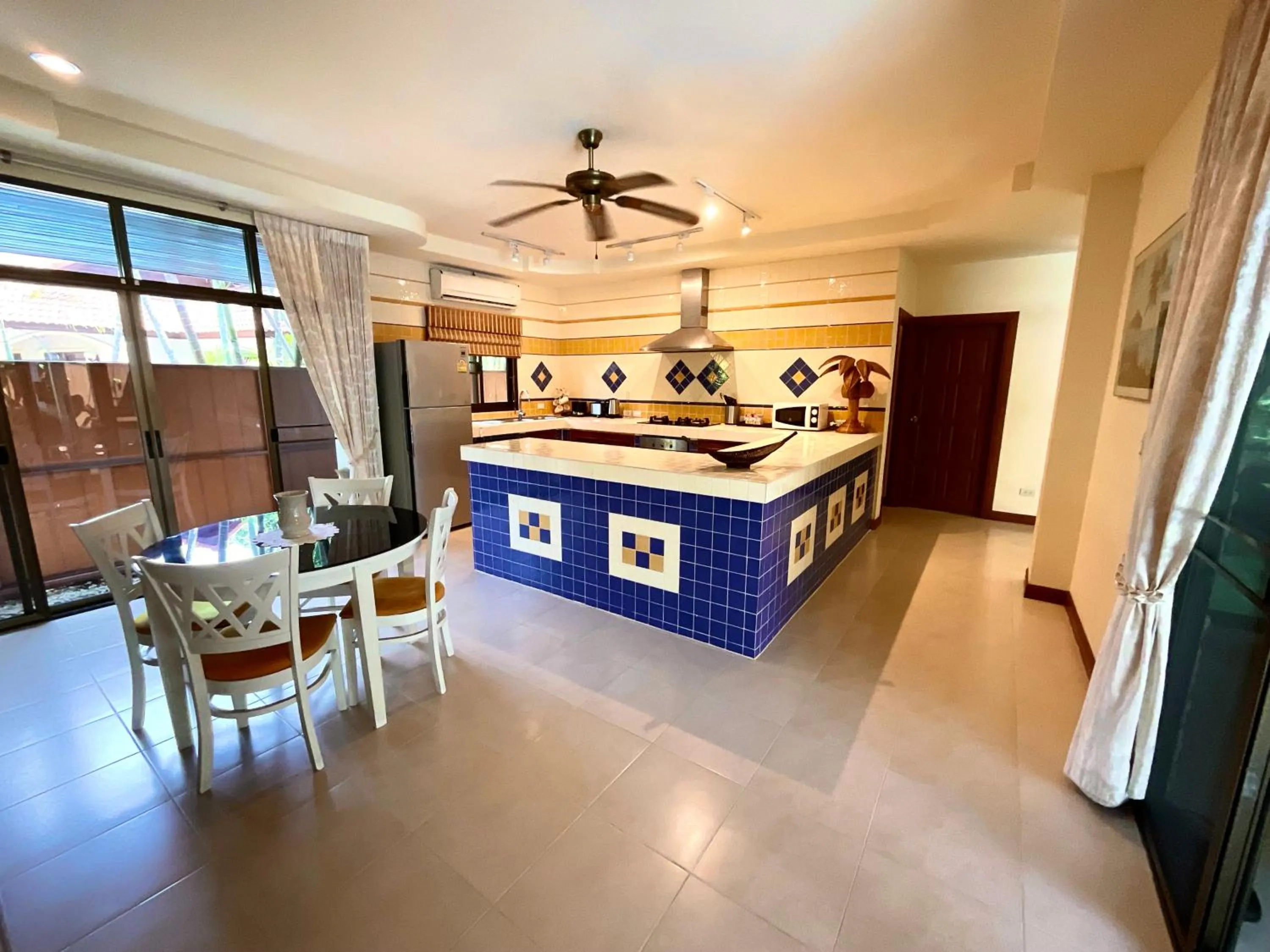 Kitchen or kitchenette in Coconut Paradise Holiday Villas