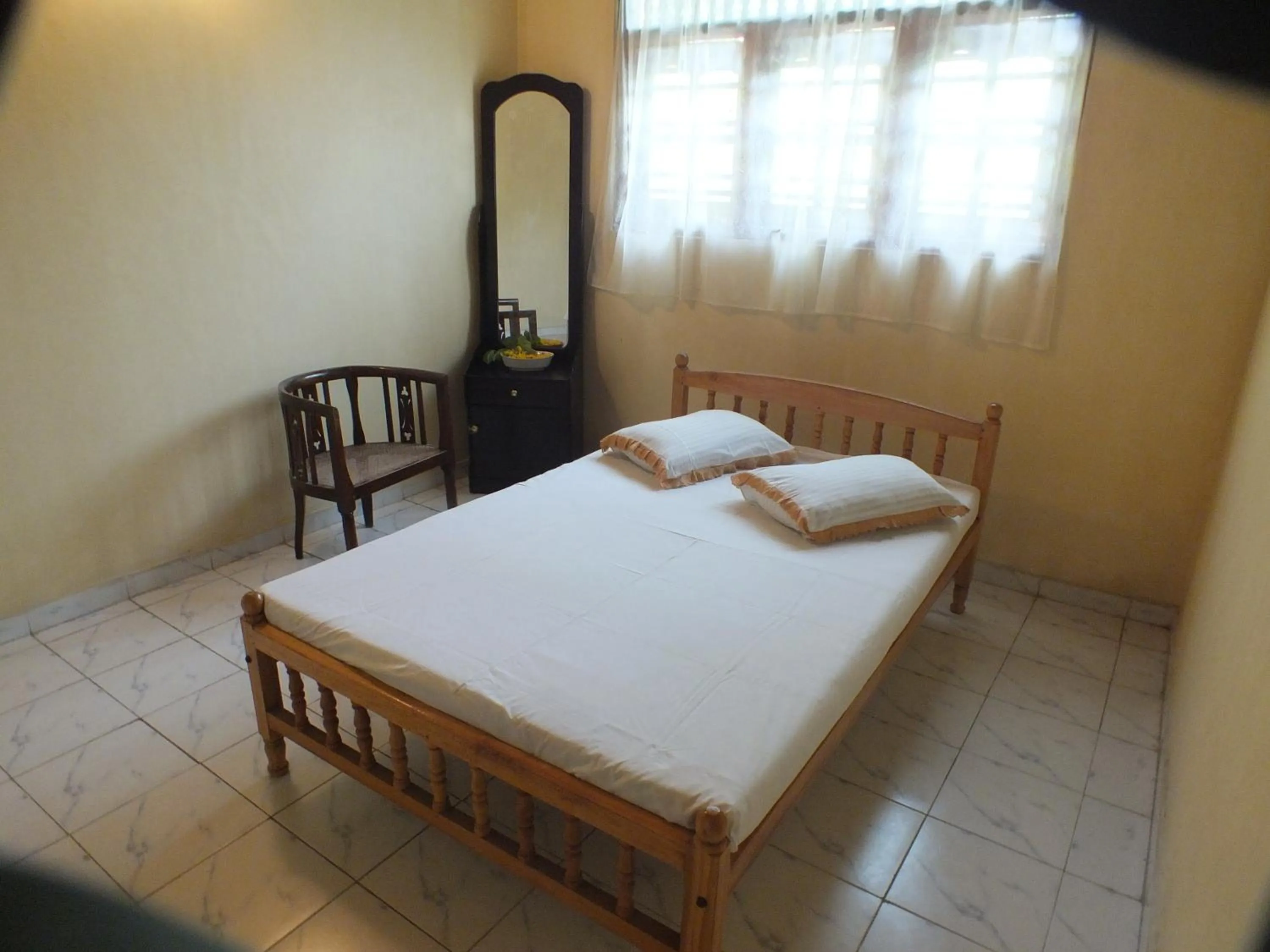 Bed in Arogya Resort