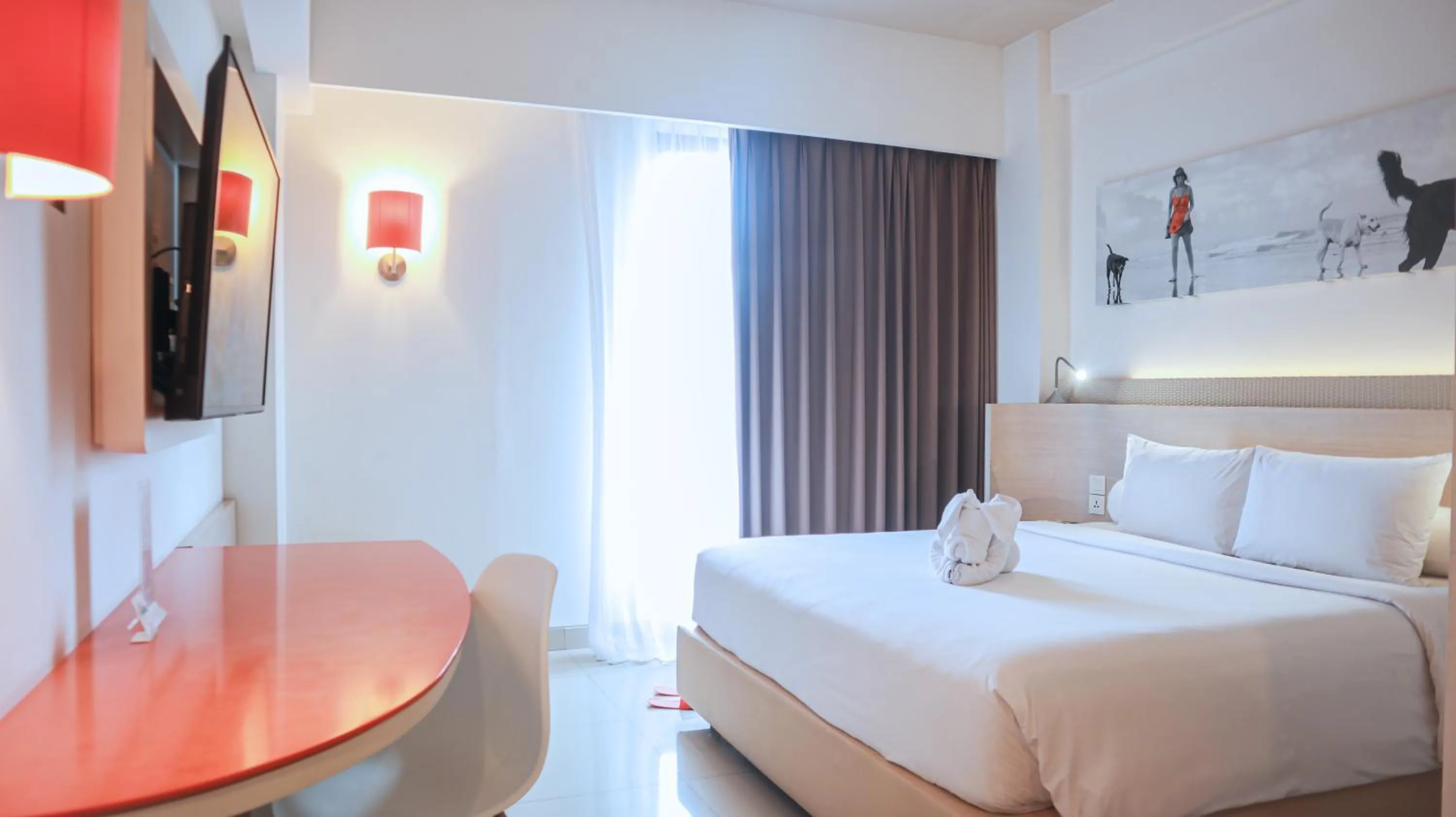 Bed in HARRIS Hotel Seminyak