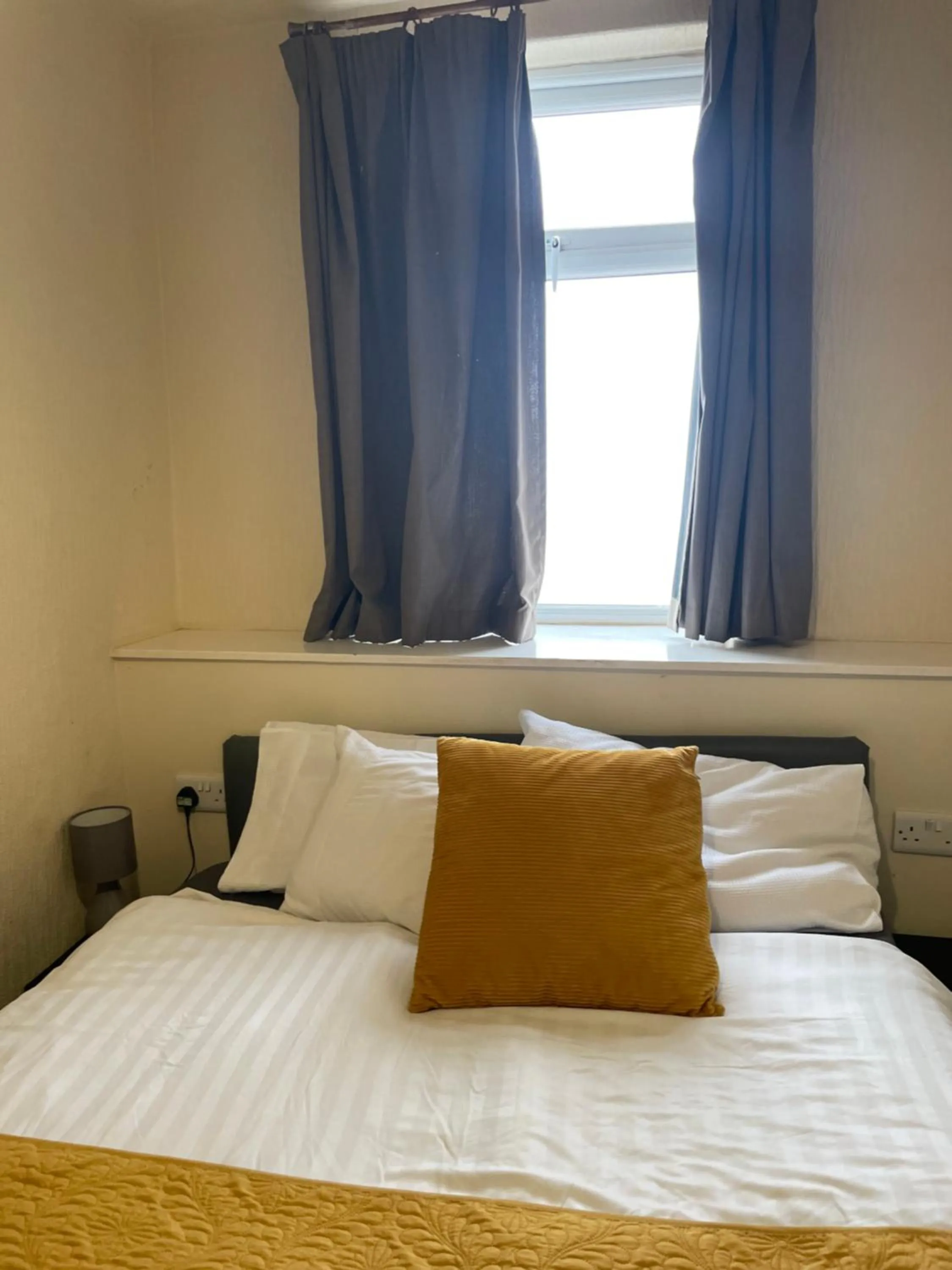 Bed in North Ocean Hotel