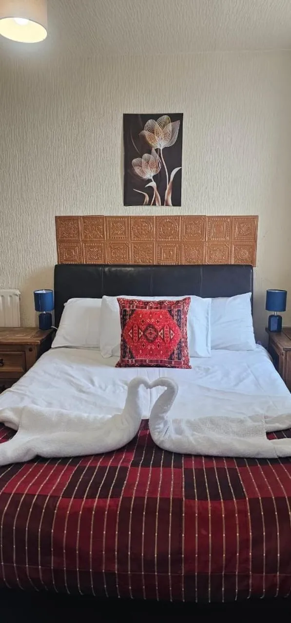 Bed in North Ocean Hotel