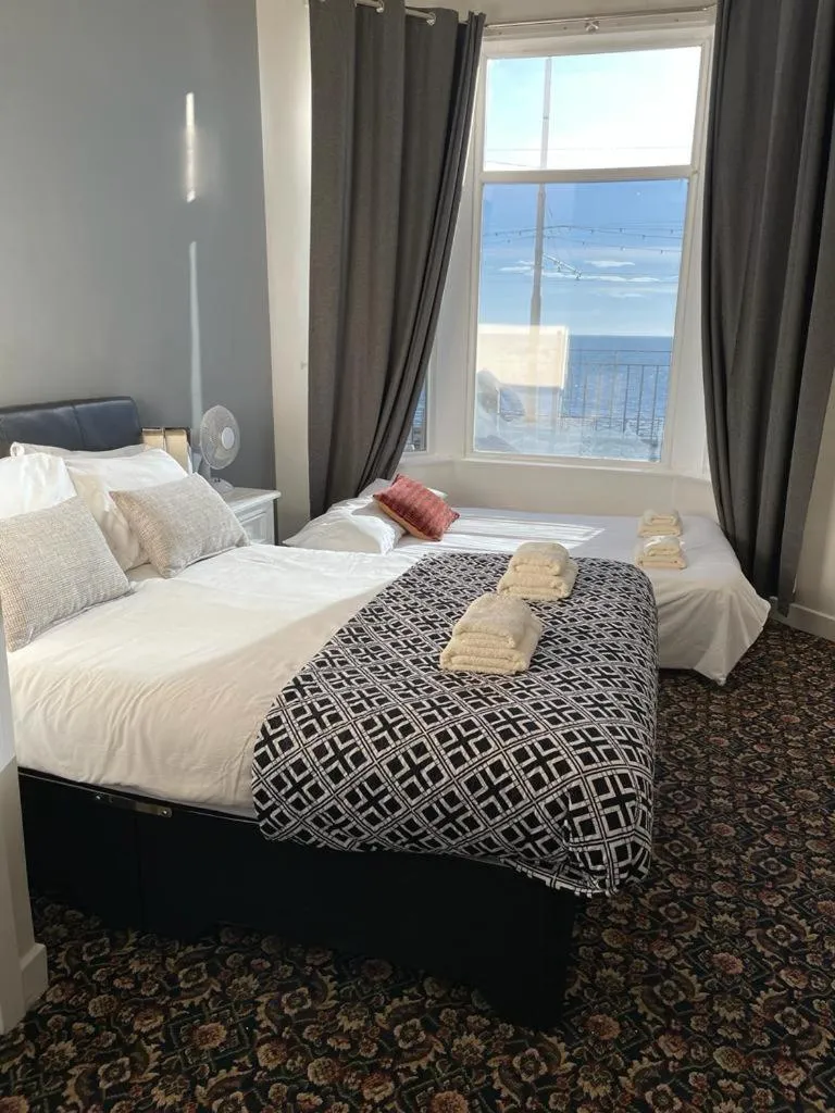 Bed in North Ocean Hotel