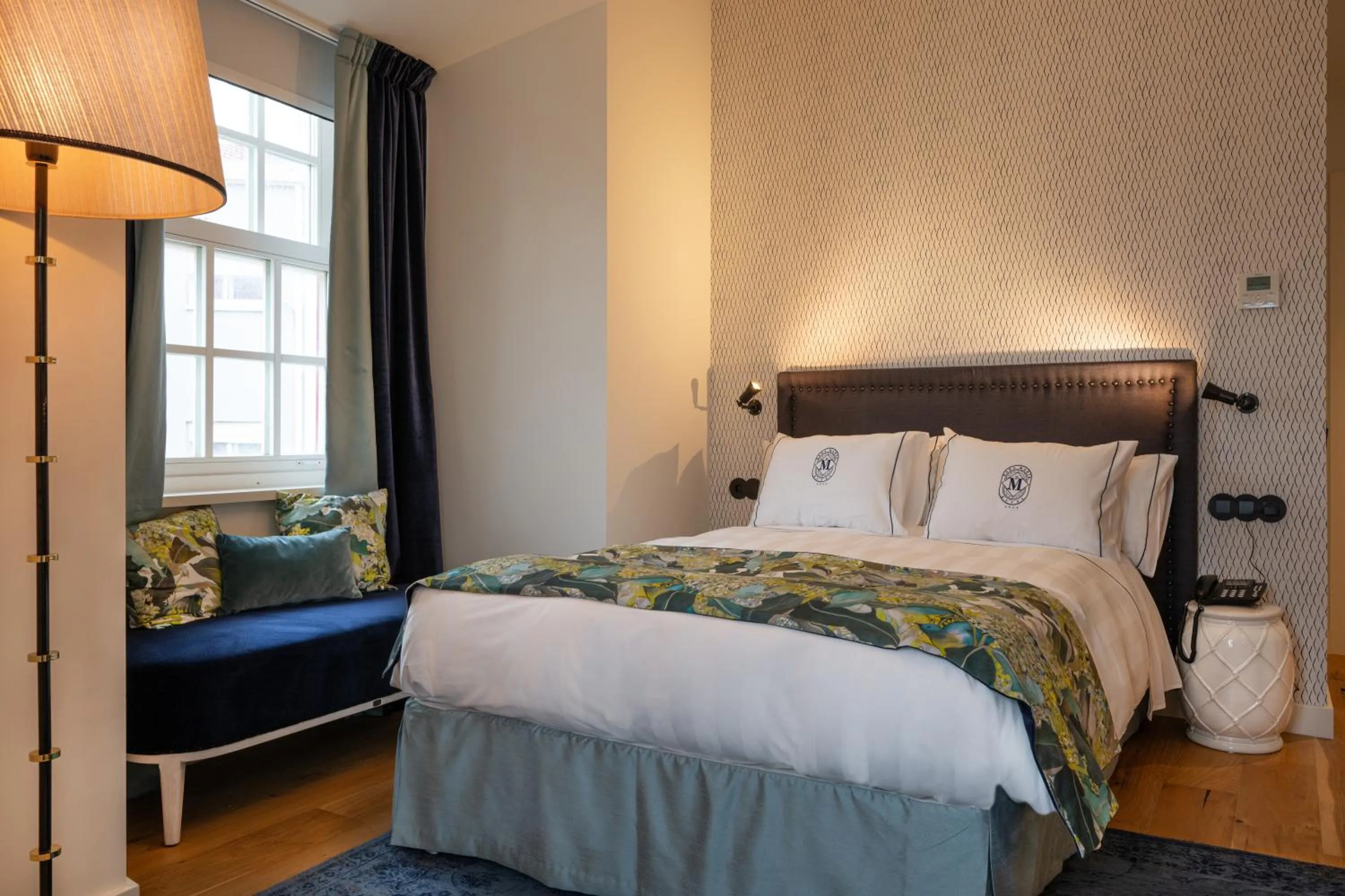 Bed in Dona Maria Hotel