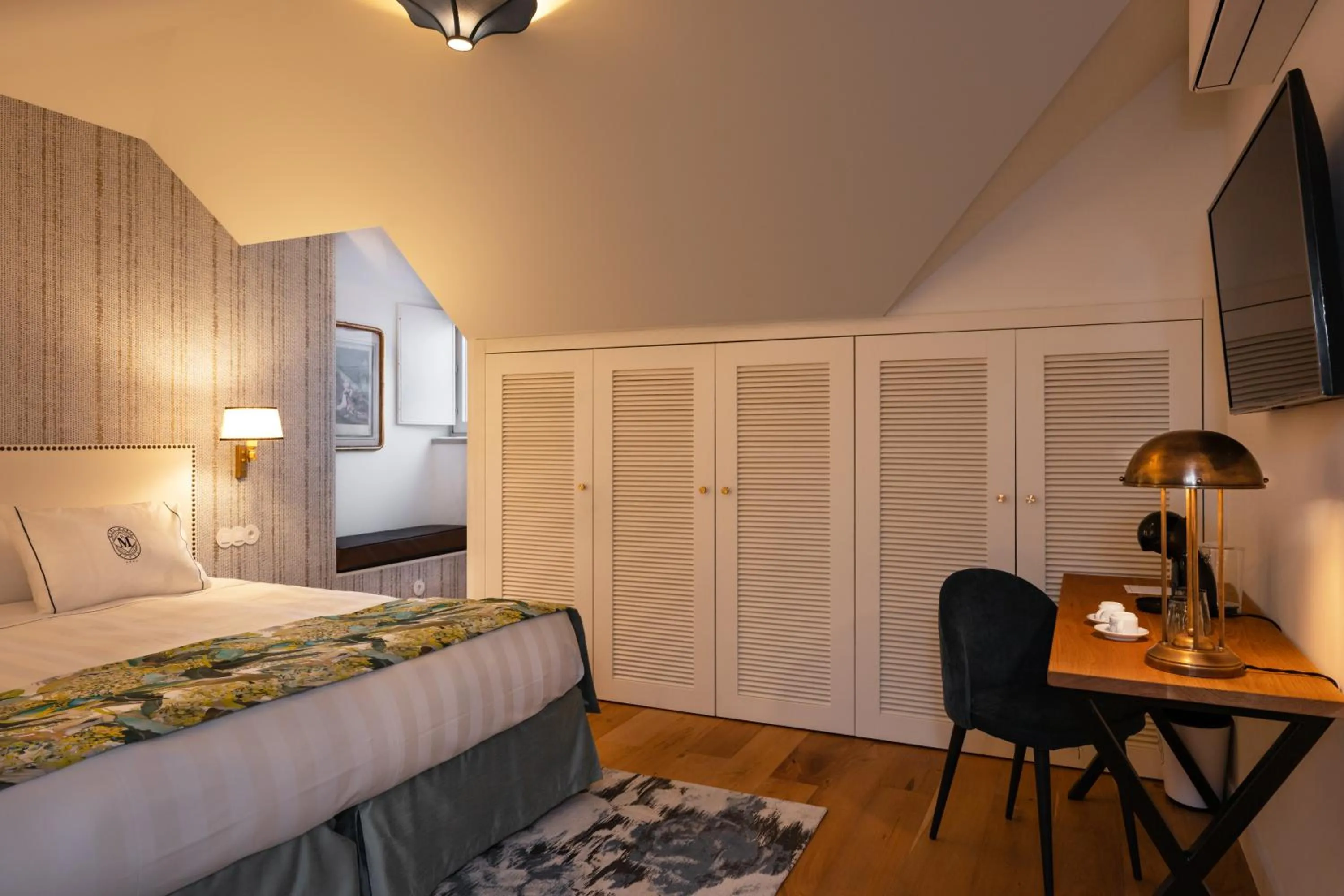 Bed in Dona Maria Hotel