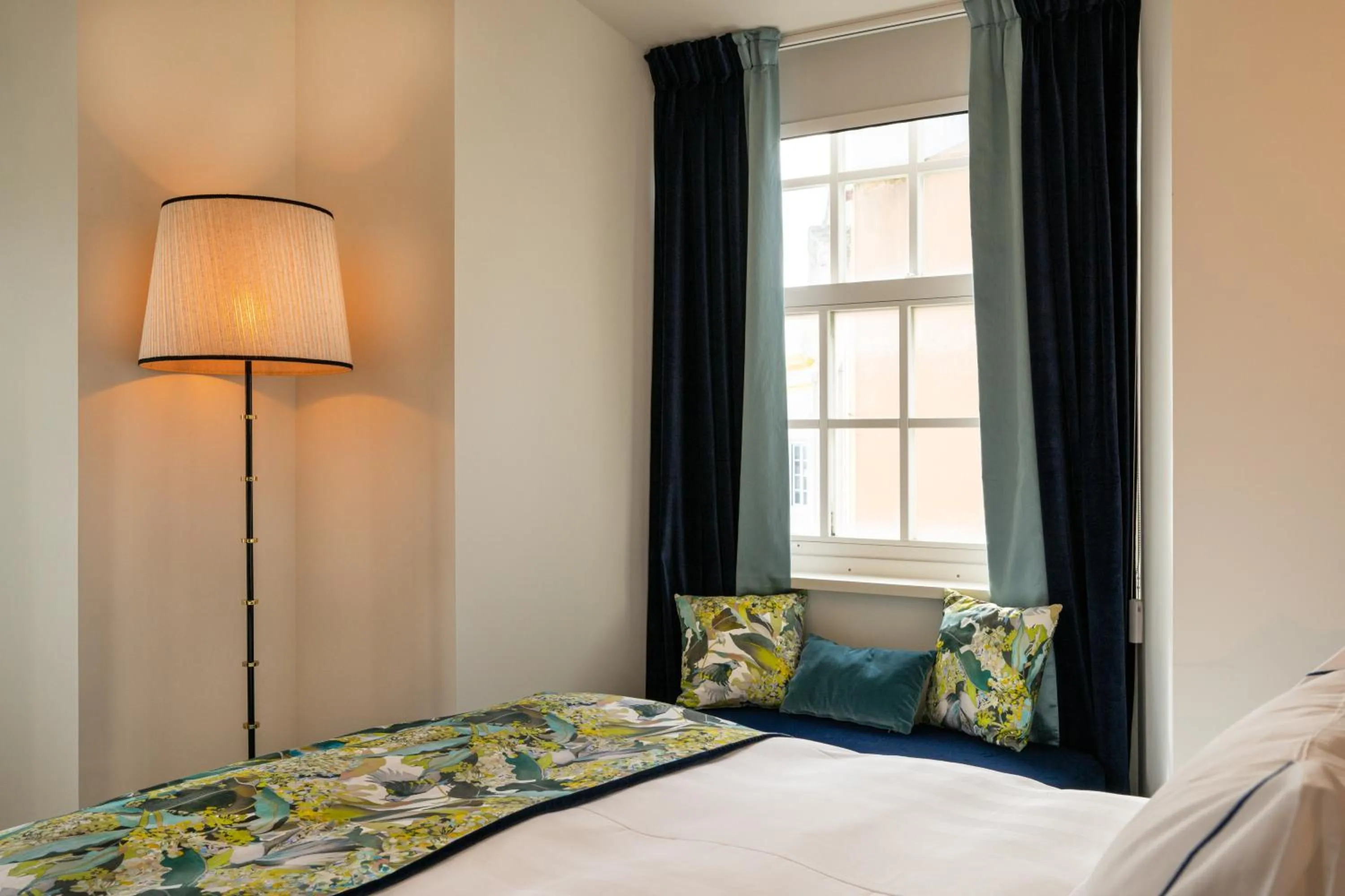 Bed in Dona Maria Hotel